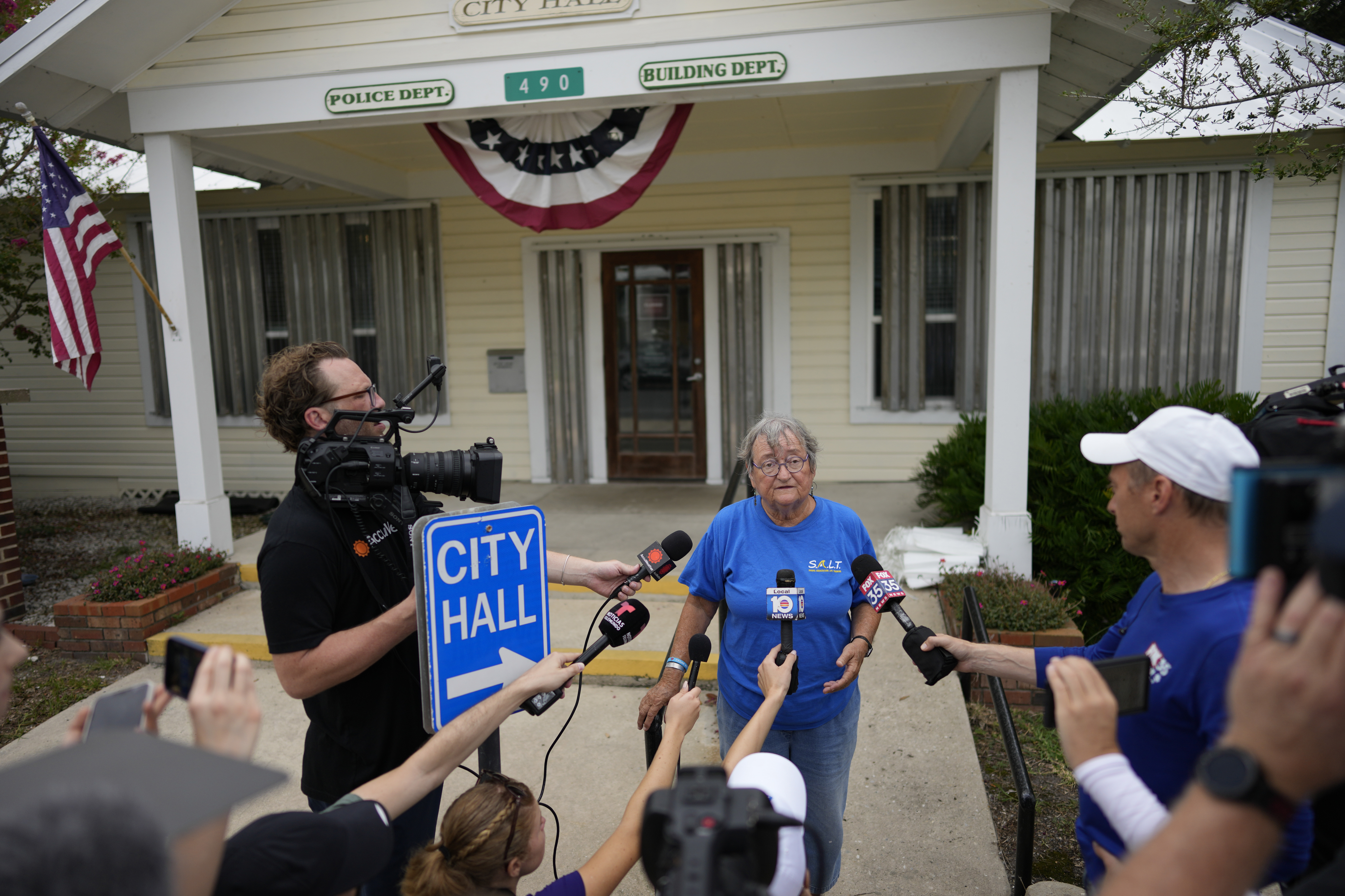 Cedar Key Commissioner Sue Colson gives a news conference outside City Hall, as the town prepares for the expected arrival of Hurricane Idalia, Tuesday, Aug. 29, 2023, in Cedar Key, Fla. 