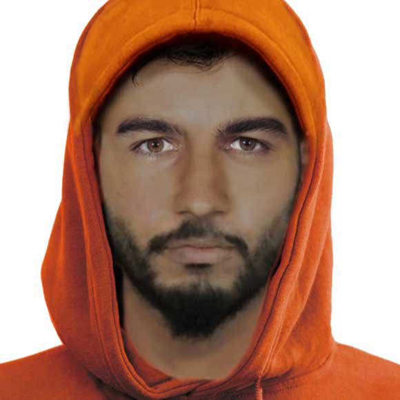 A digitally enhanced image taken from CCTV of a person police wish to speak with in relation to the fire.