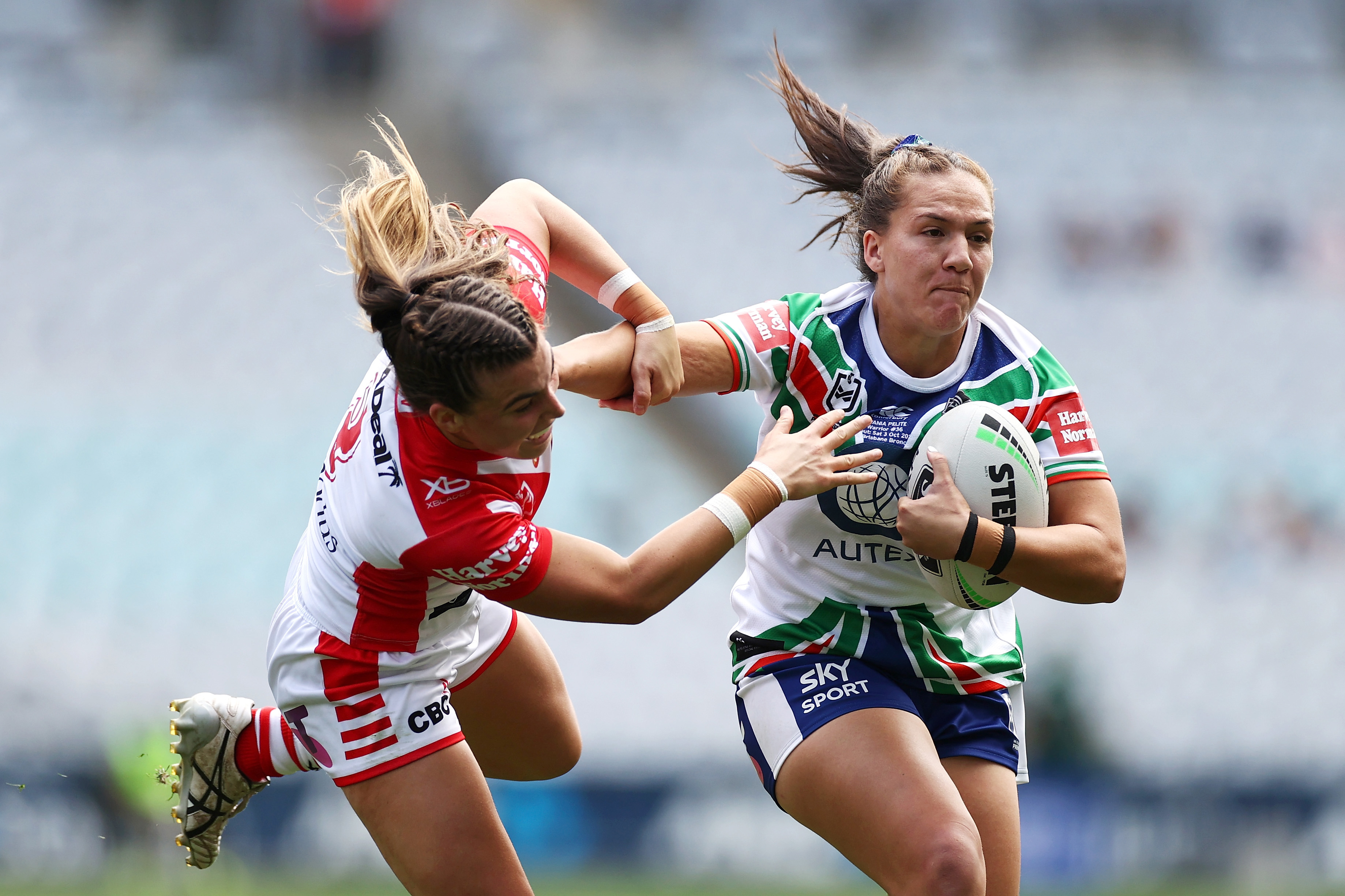 Georgia Hale of the Warriors is tackled during a 2020 game.