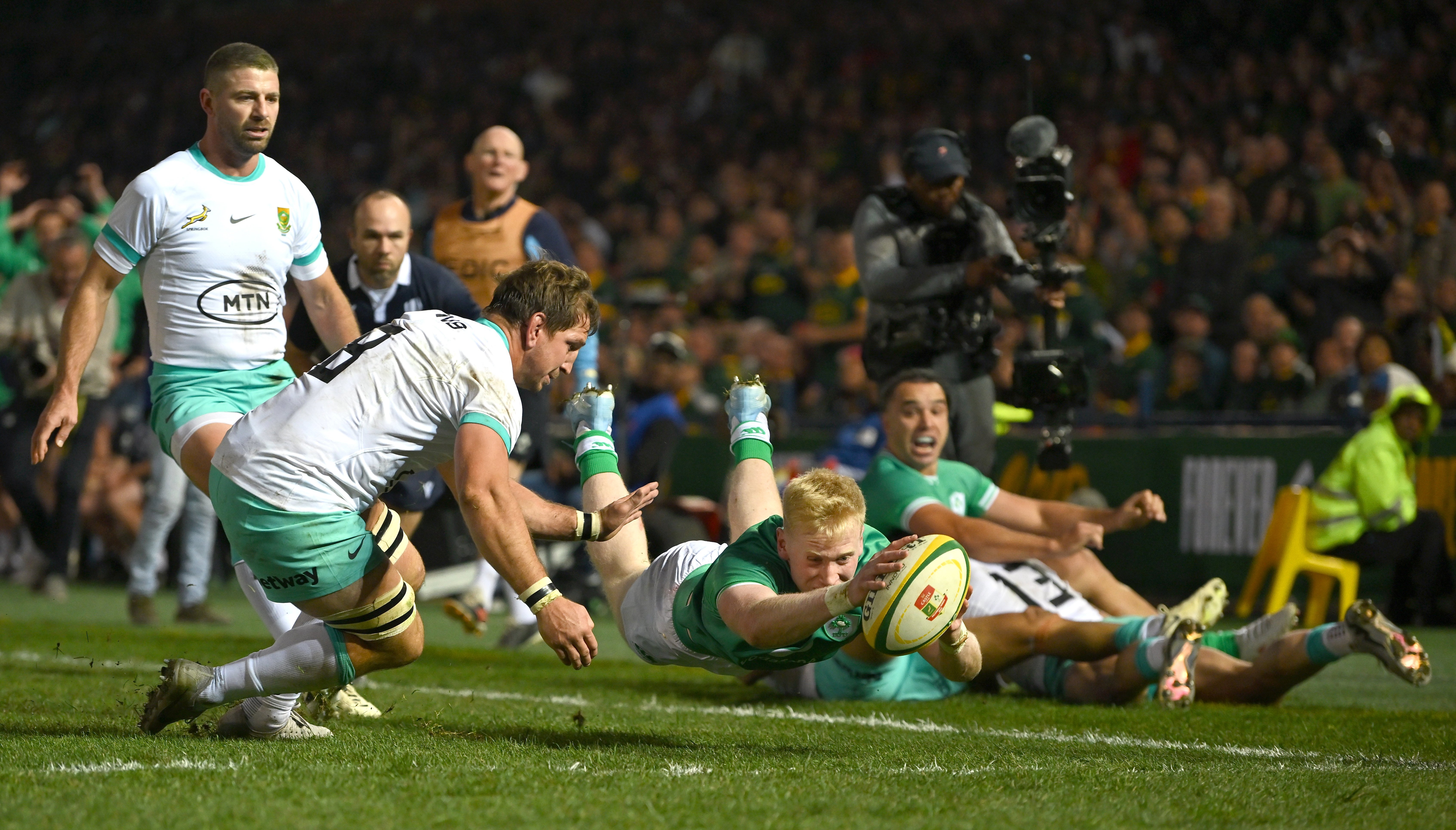 Jamie Osborne of Ireland scores his side's first try despite the tackle of Kwagga Smith of South Africa during the first test between South Africa and Ireland at Loftus Versfeld Stadium in Pretoria, South Africa. (Photo By Brendan Moran/Sportsfile via Getty Images)