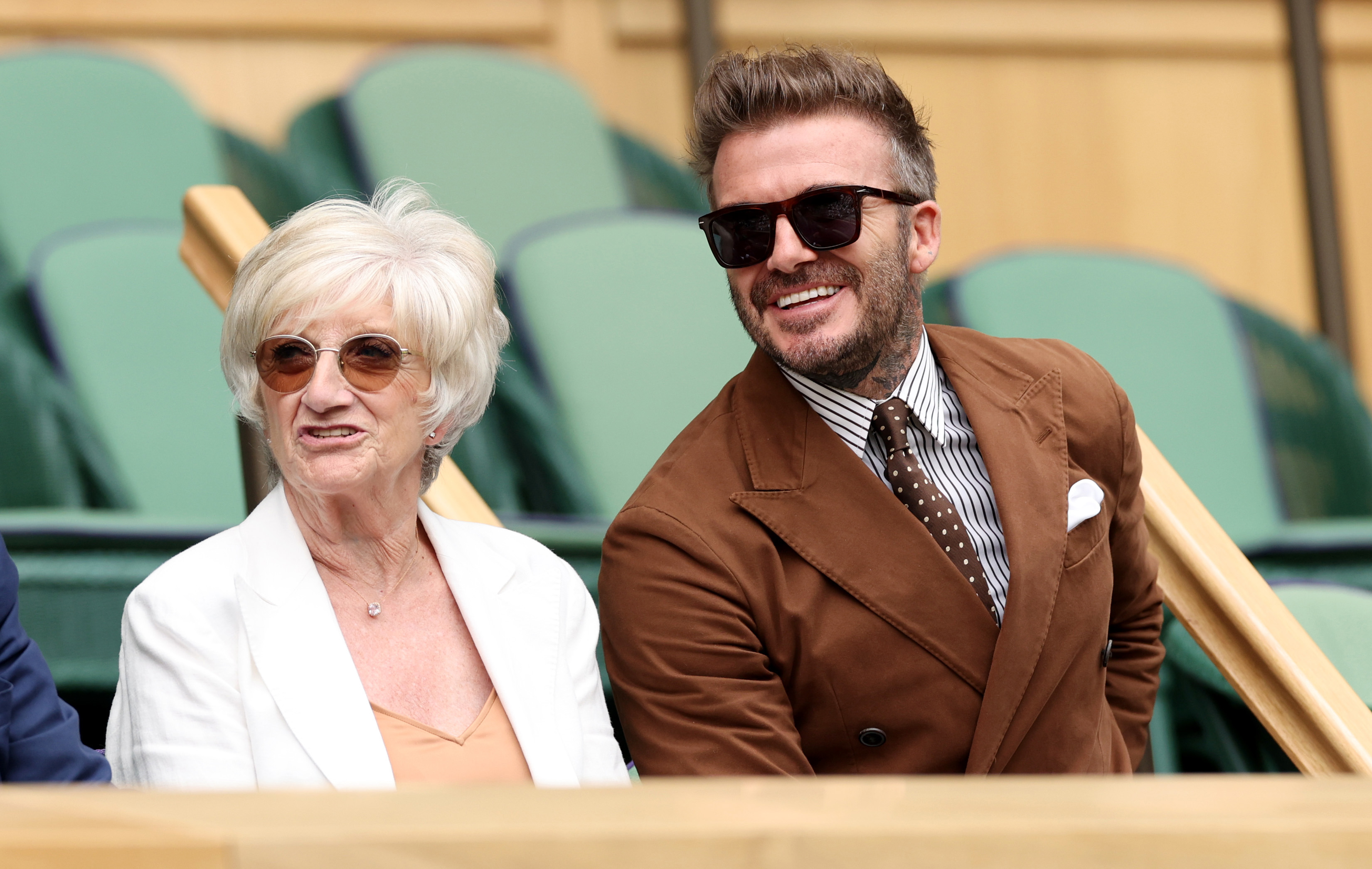 LONDON, ENGLAND - JULY 06: Sandra Beckham and David Beckham watch on from the royal box prior to the match between Rafael Nadal of Spain and Taylor Fritz of The United States during their Men's Singles Quarter Final match on day ten of The Championships Wimbledon 2022 at All England Lawn Tennis and Croquet Club on July 06, 2022 in London, England. (Photo by Clive Brunskill/Getty Images)