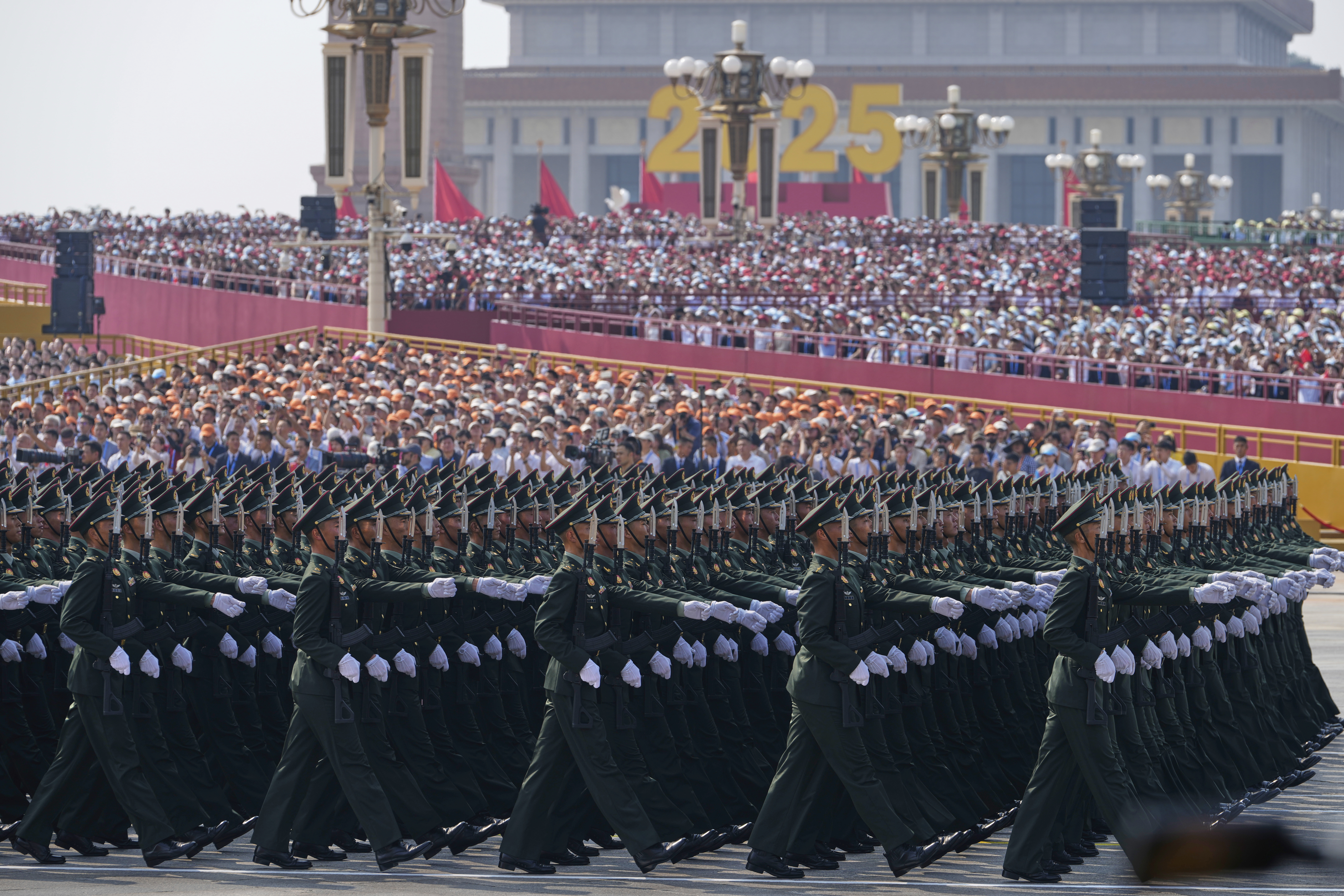 Military personnel take part in a military parade to commemorate the 80th anniversary of Japan's World War II surrender held in front of Tiananmen Gate in Beijing, Wednesday, Sept. 3, 2025. (AP Photo/Ng Han Guan)