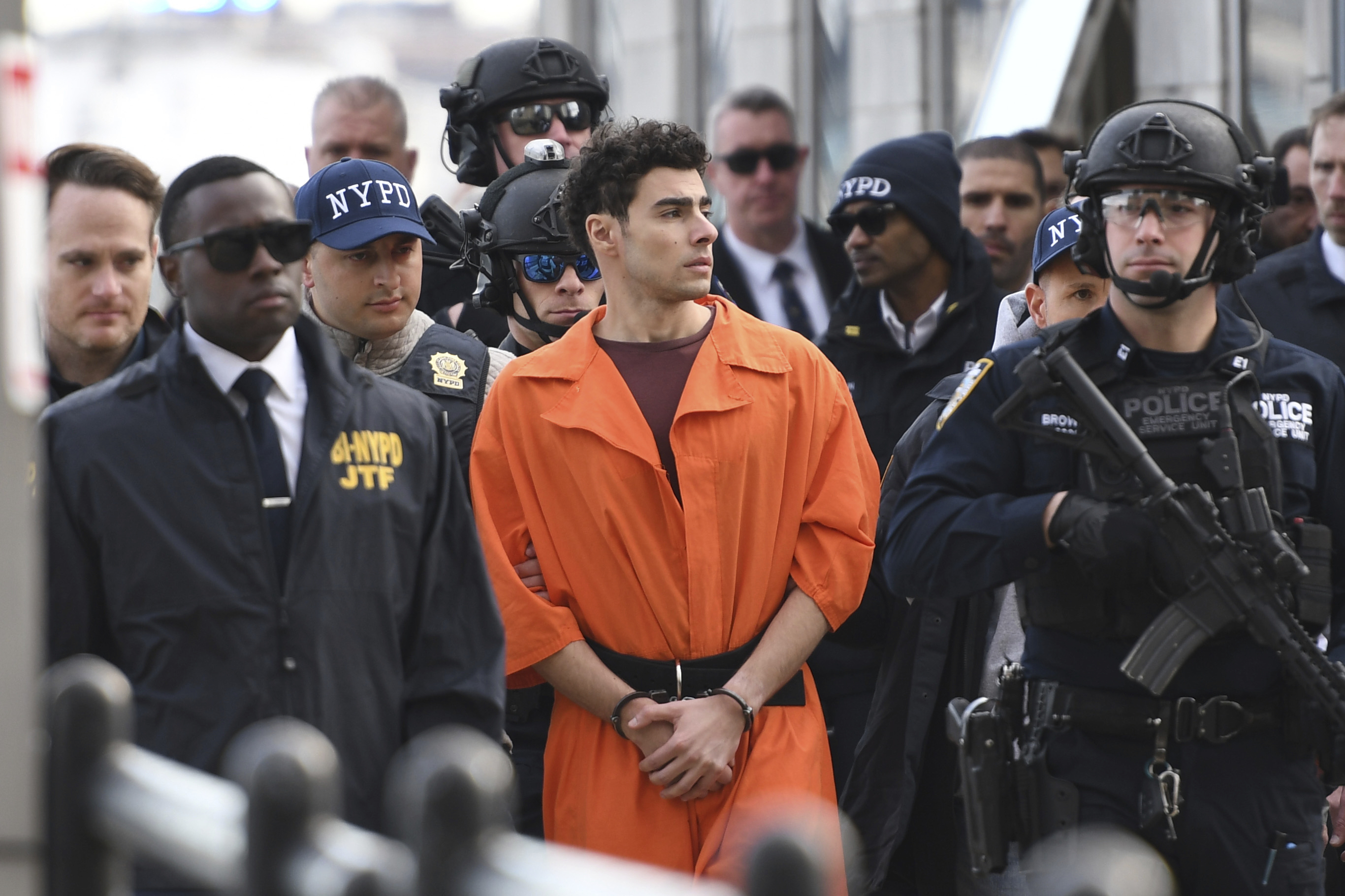 Accused CEO killer asks fans to slow down on sending pics