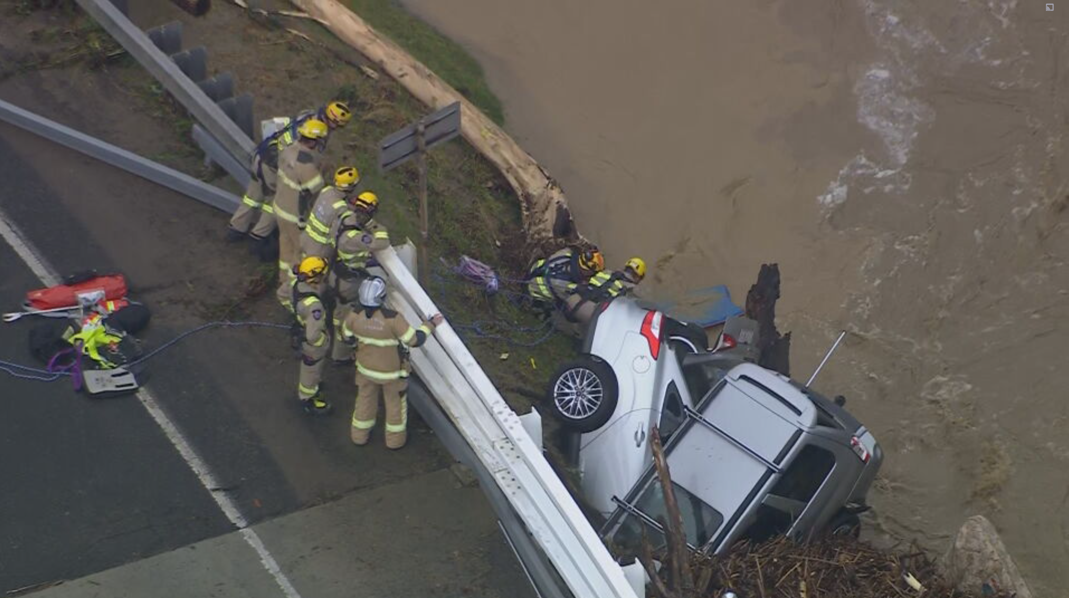 Cars and debris remain stacked up against the Cumberland Bridge.