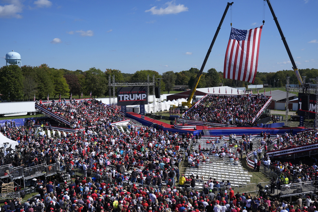 Supporters arrive before Republican presidential nominee former President Donald Trump speaks at Butler