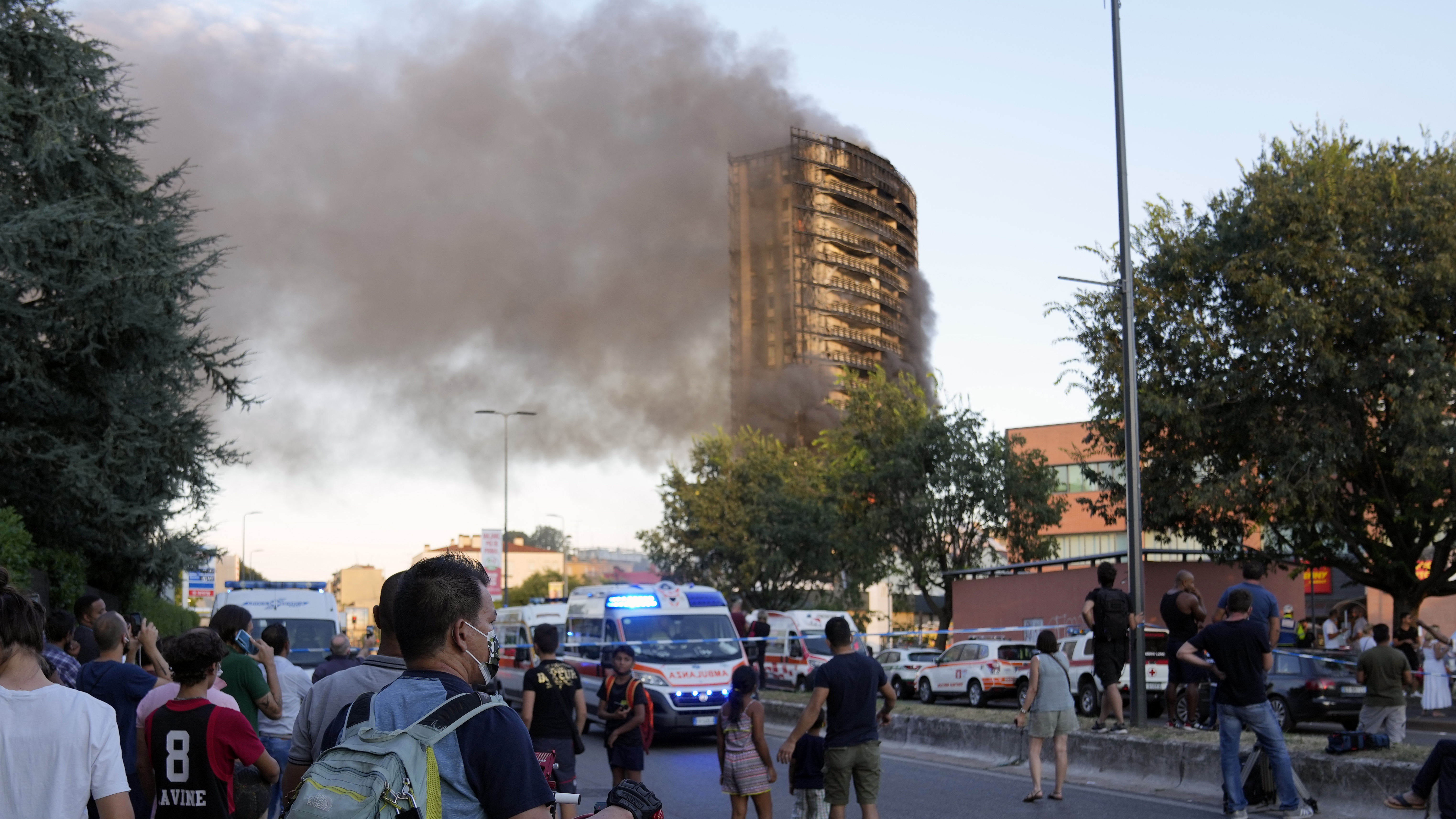 Smoke billows from a building in Milan, Italy.