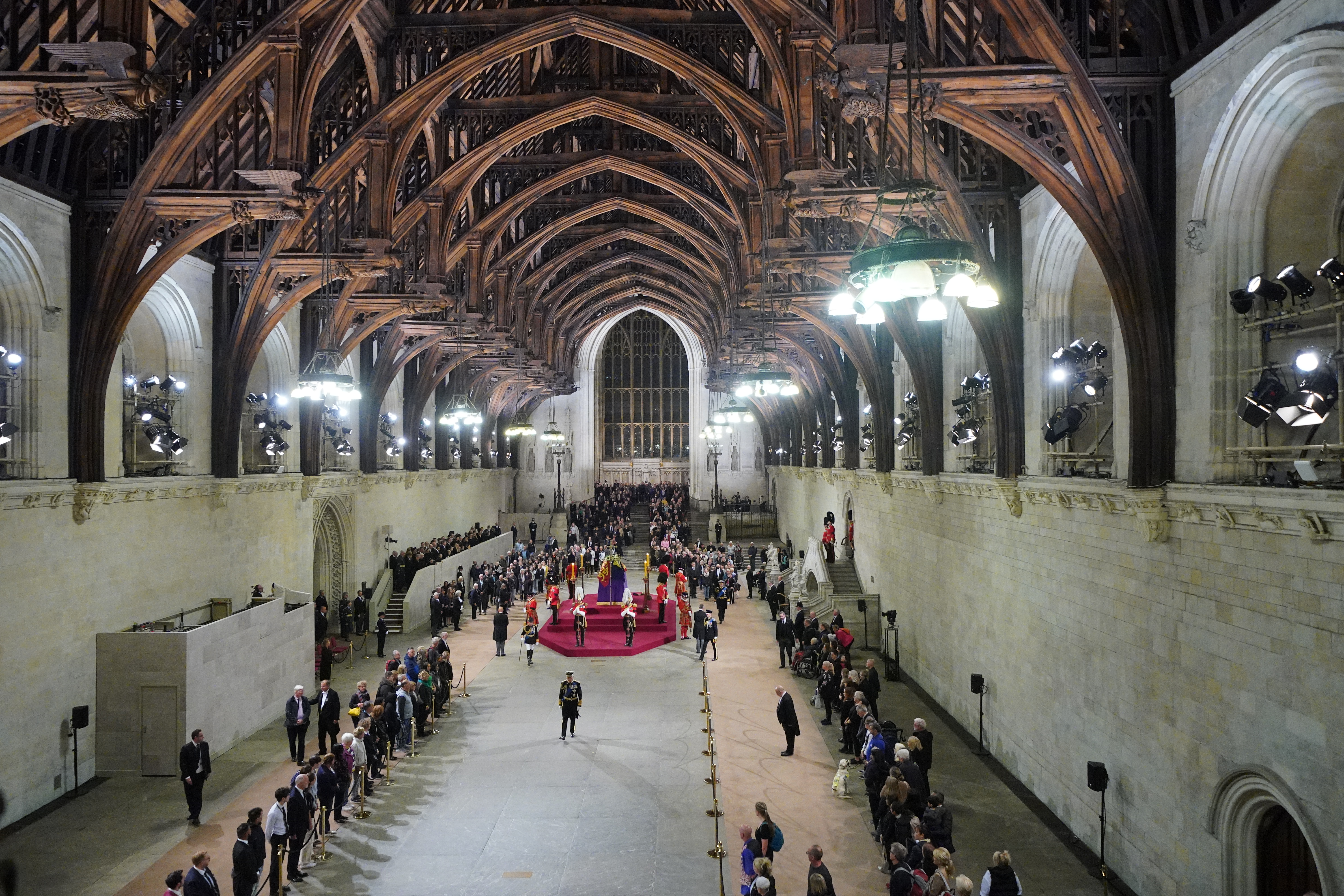 King Charles III, Anne, Princess Royal, Prince Andrew, Duke of York and Prince Edward, Earl of Wessex depart after holding a vigil beside the coffin of their mother, Queen Elizabeth II, as it lies in state on the catafalque in Westminster Hall, at the Palace of Westminster, ahead of her funeral on Monday, on September 16, 2022 in London, England. (Photo Yui Mok - WPA Pool/Getty Images)