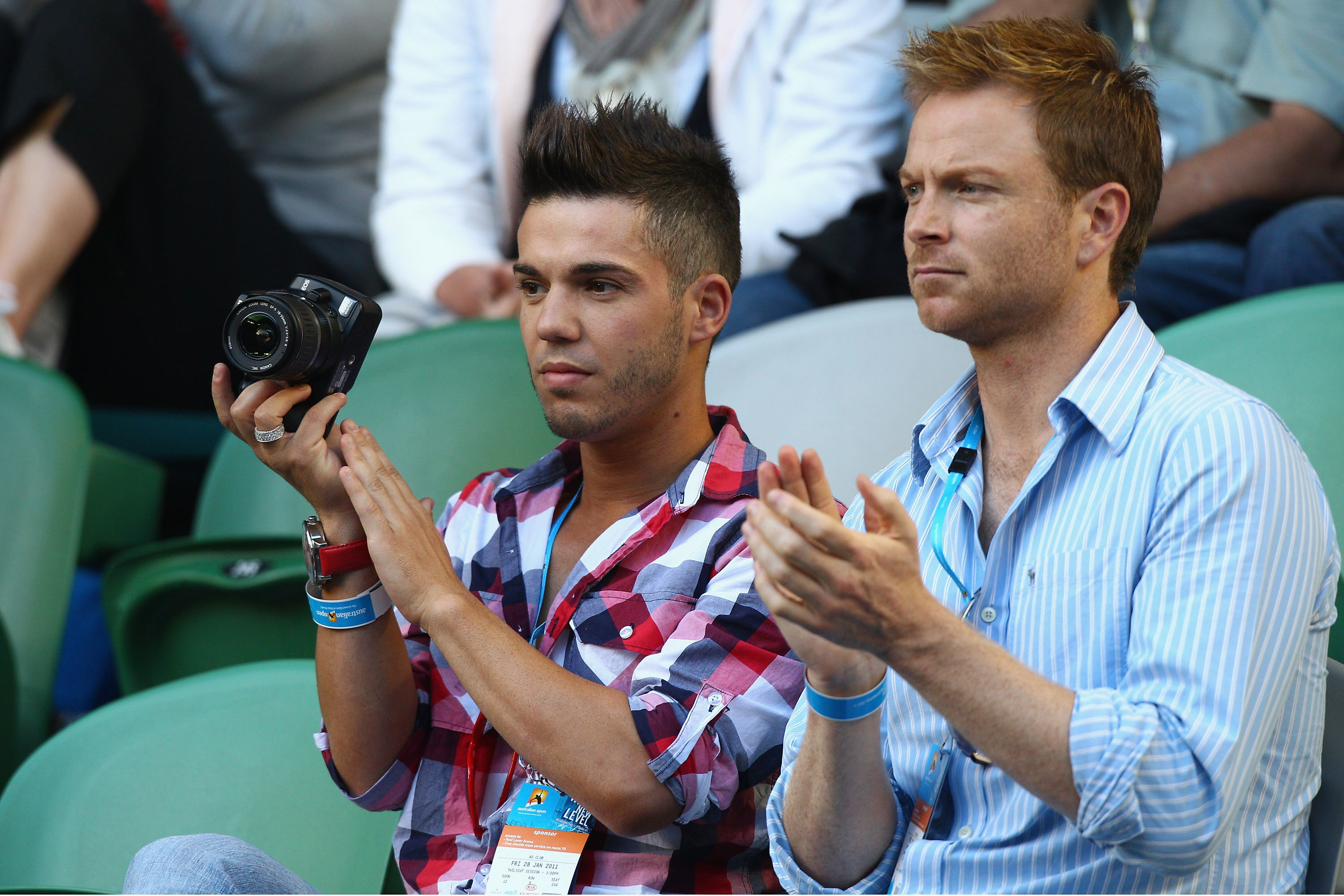 Anthony Callea and Tim Campbell during day 12 of the 2011 Australian Open at Melbourne Park on January 28, 2011 in Melbourne, Australia.