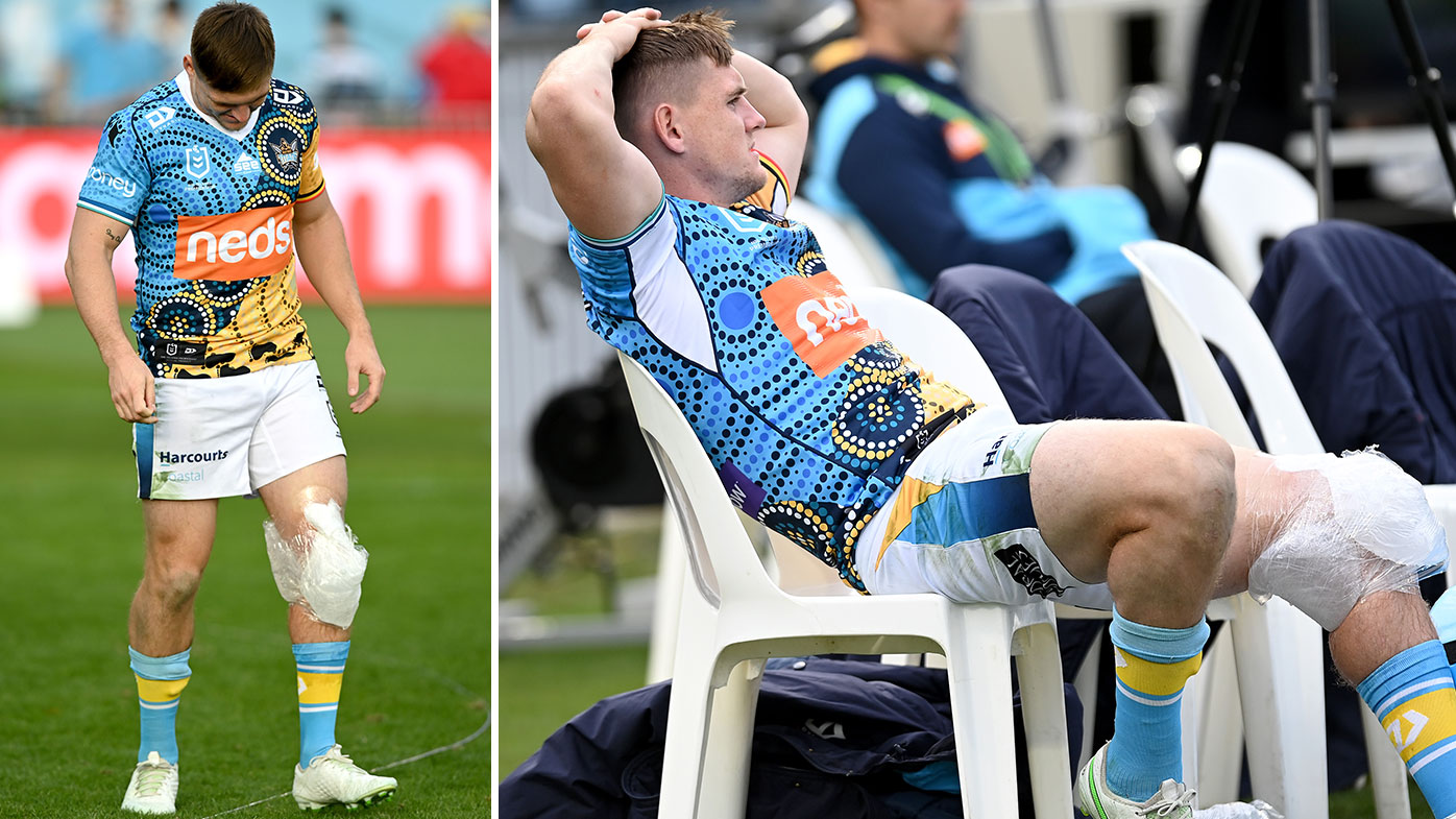AJ Brimson of the Titans is seen with his knee in an ice pack after being injured during the round 12 NRL match between the Cronulla Sharks and the Gold Coast Titans at C.ex Coffs International Stadium, on May 30, 2021, in Coffs Harbour, Australia. (Photo by Bradley Kanaris/Getty Images)