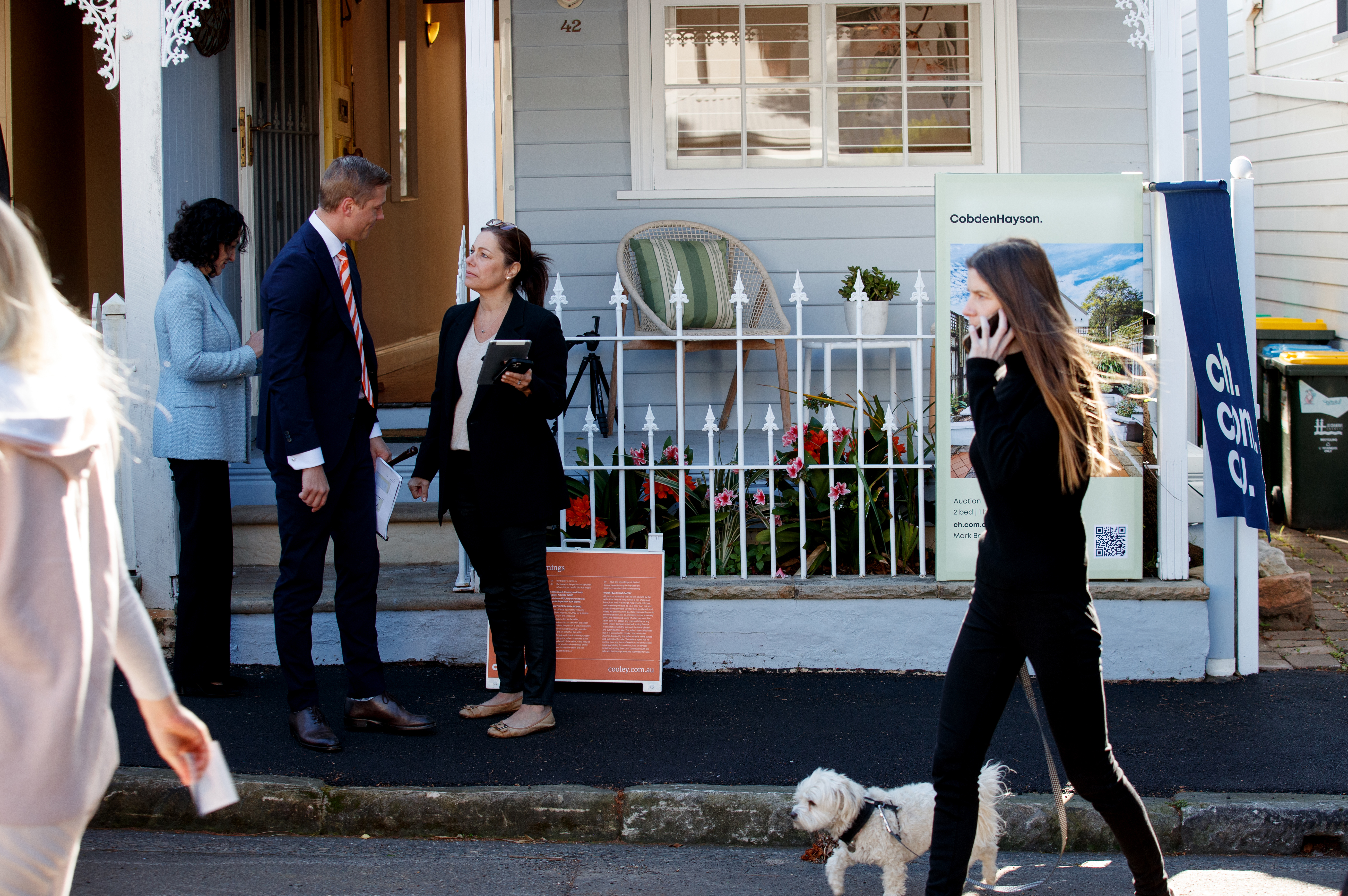 Potential bidders attend an auction