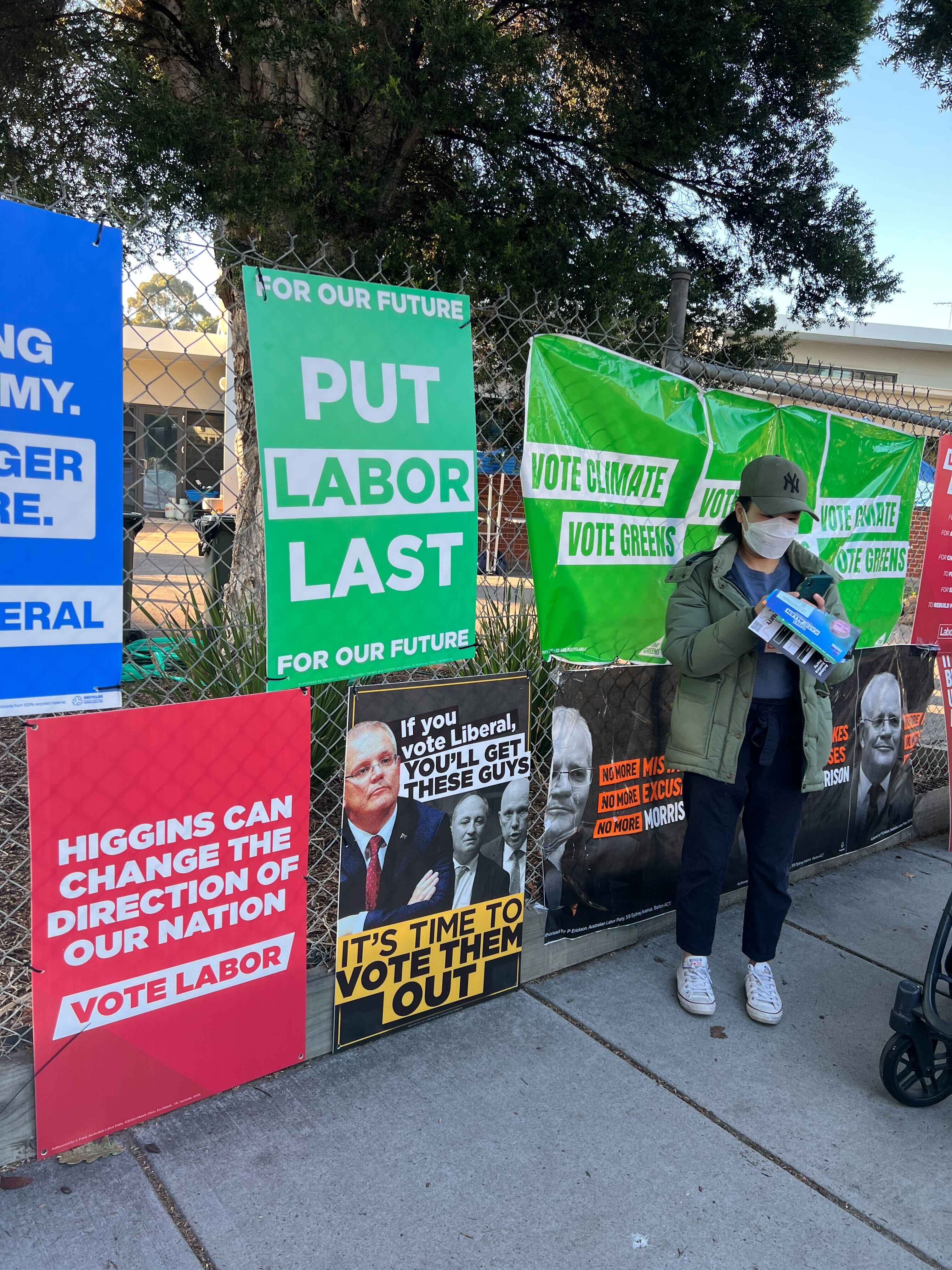 Labor is seeking an injunction over "Put Labor Last" signs appearing in Higgins, designed to look like they were placed by the Greens but allegedly from the Liberal Party.