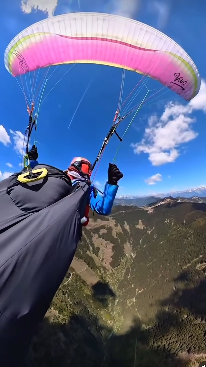 Video shows paraglider's heart-stopping fall after plane collision