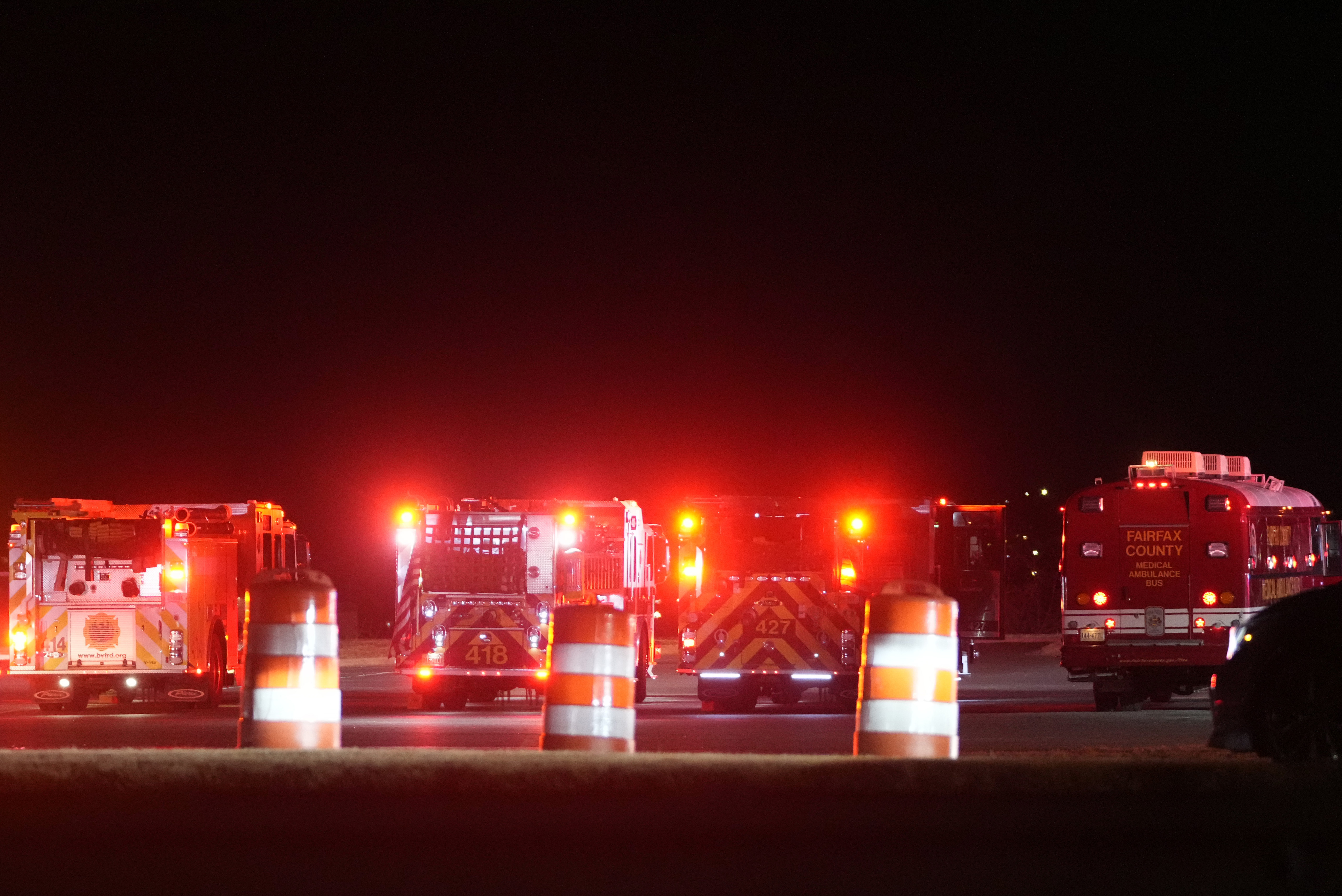 Emergency equipment stages at Gravelly Point, north of Ronald Reagan Washington National Airport, along the Potomac River, Wednesday, Jan. 29, 2025, in Arlington, Va.