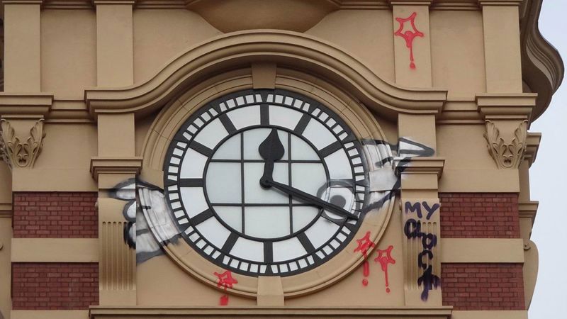 A 21-year-old man has been arrested in connection with a series of graffiti works across Melbourne, including the iconic 'Pam the Bird' tag. 