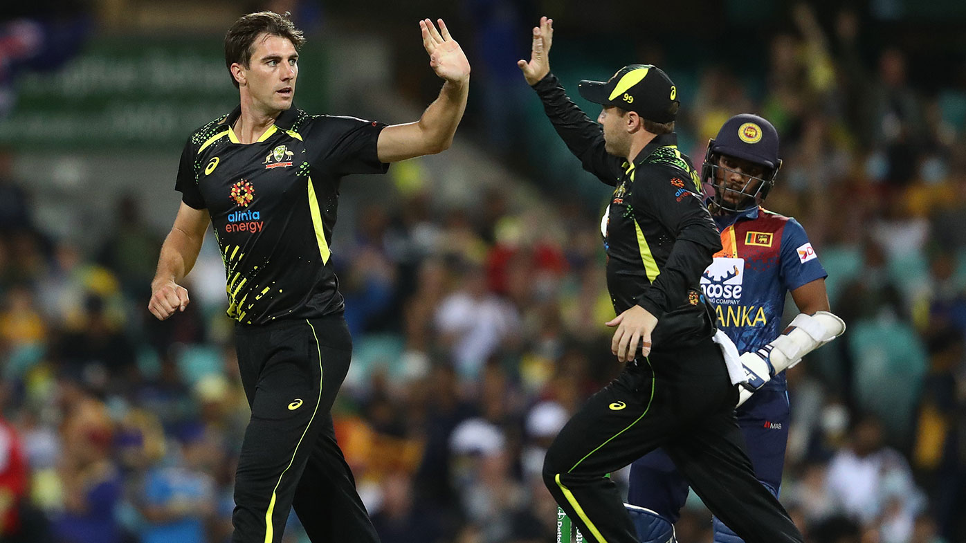 Pat Cummins of Australia celebrates taking the wicket of Avishka Fernando of Sri Lanka 