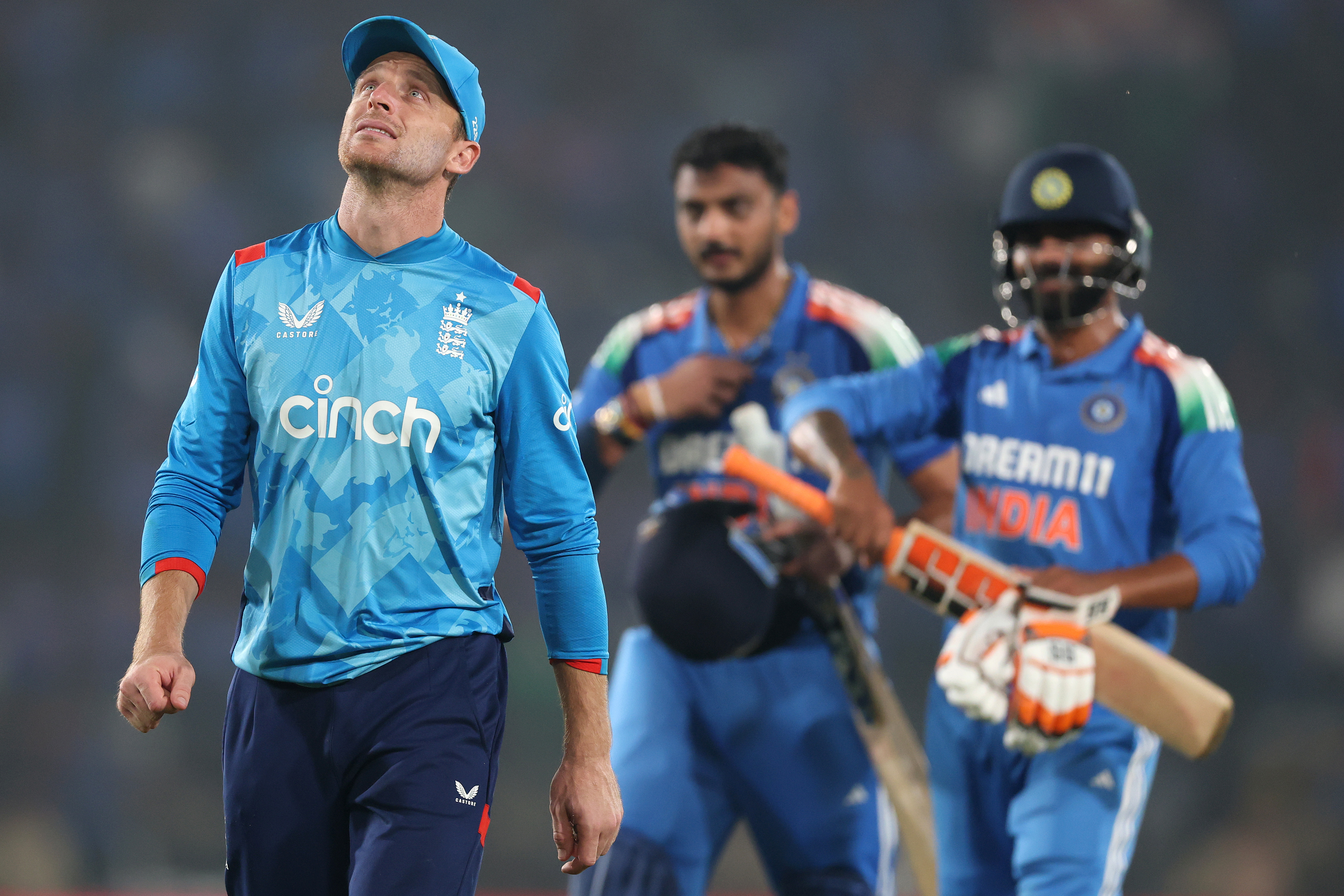 England captain Jos Buttler walks off the field.