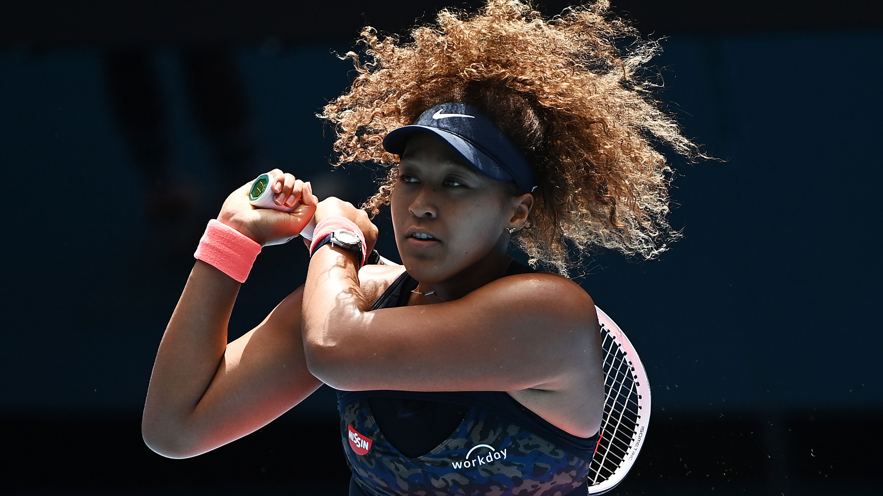 Naomi Osaka hits a backhand in her Australian Open quarter final.