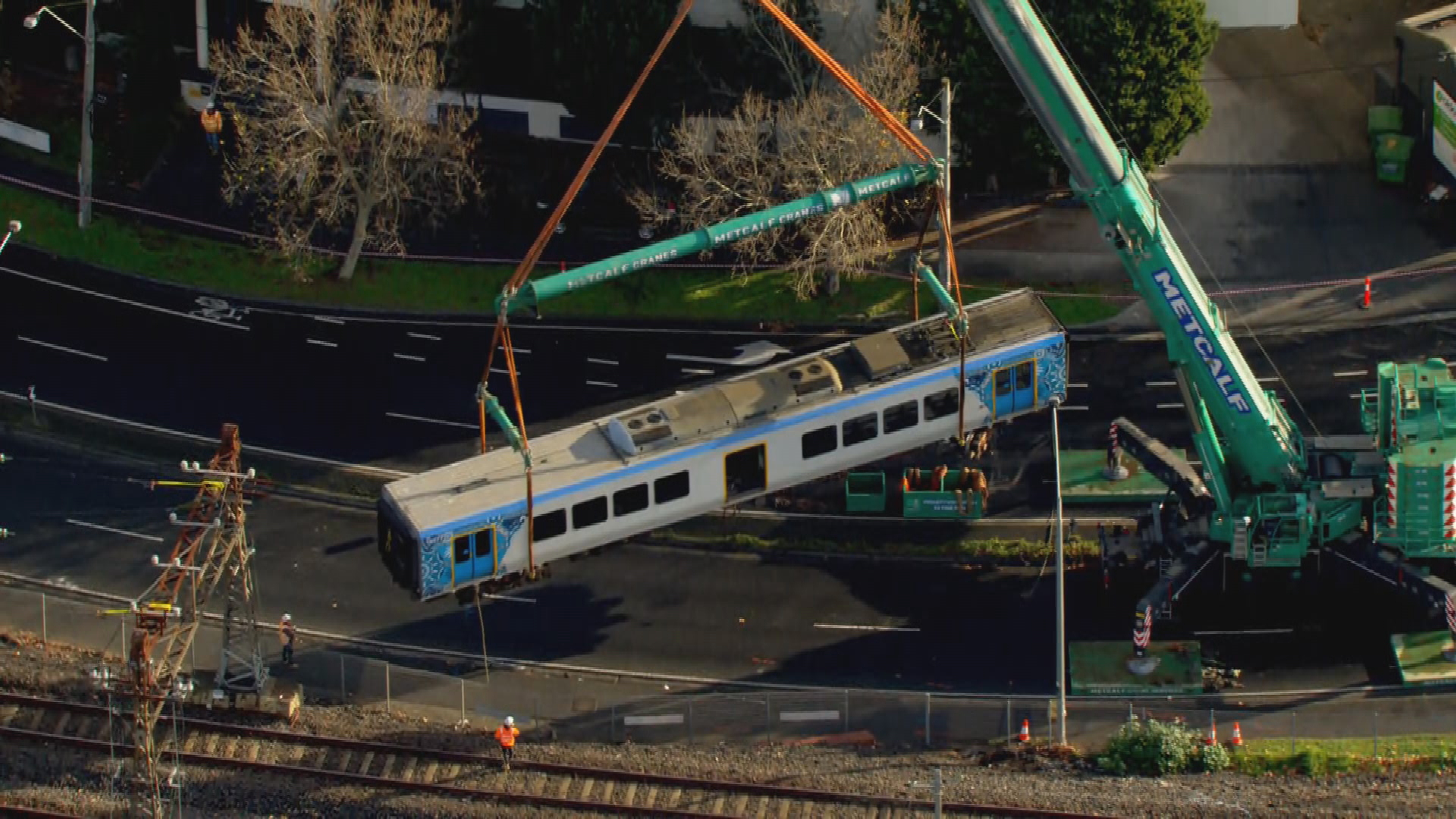 The faulty train carriage was lifted from the tracks this afternoon.