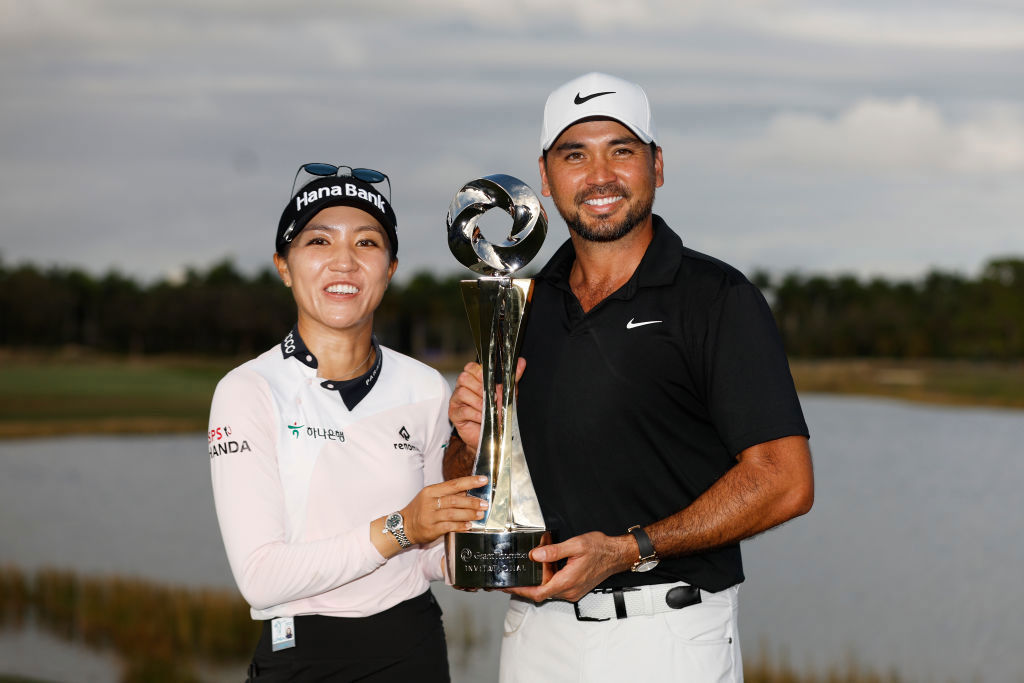 Lydia Ko (L) and Jason Day (R) with the Grant Thornton Invitational trophy.