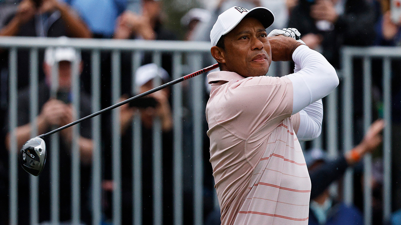 Tiger Woods of the United States plays his shot on the first tee during the first round of the PNC Championship at The Ritz-Carlton Golf Club on December 16, 2023 in Orlando, Florida. (Photo by Mike Mulholland/Getty Images)