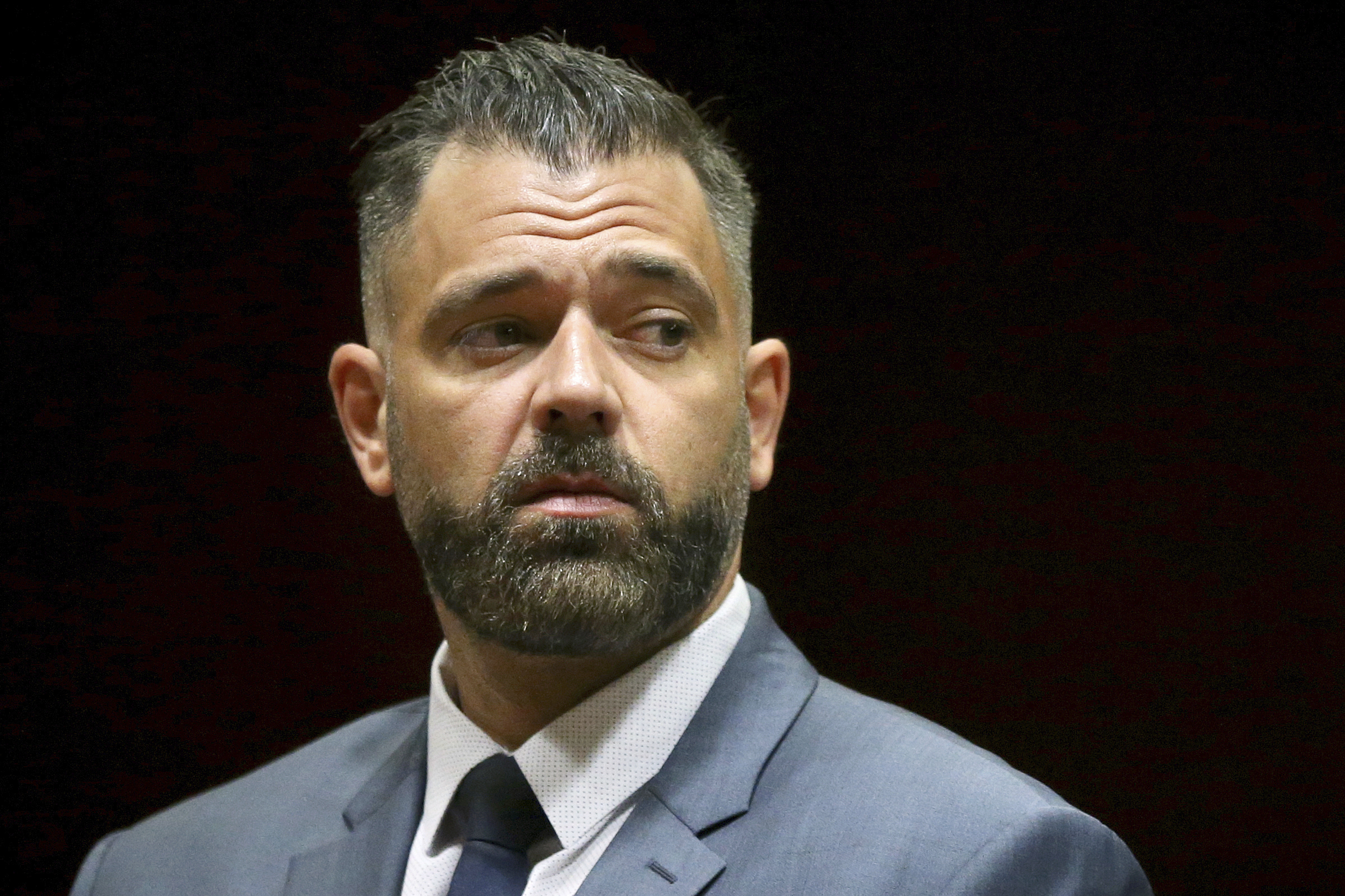 FILE - In this May 28, 2019, photo, Mark D'Amico stands during his arraignment to charges including theft by deception at Burlington County Superior Court in Mount Holly, N.J. D'Amico, who conspired with his former girlfriend to cook up a feel-good story about a helpful homeless man and then used the lie to raise hundreds of thousands of dollars in donations online has been sentenced in federal court. DAmico received a 27-month term on Friday, April 1, 2022. (Tim Tai/The Philadelphia Inquirer vi