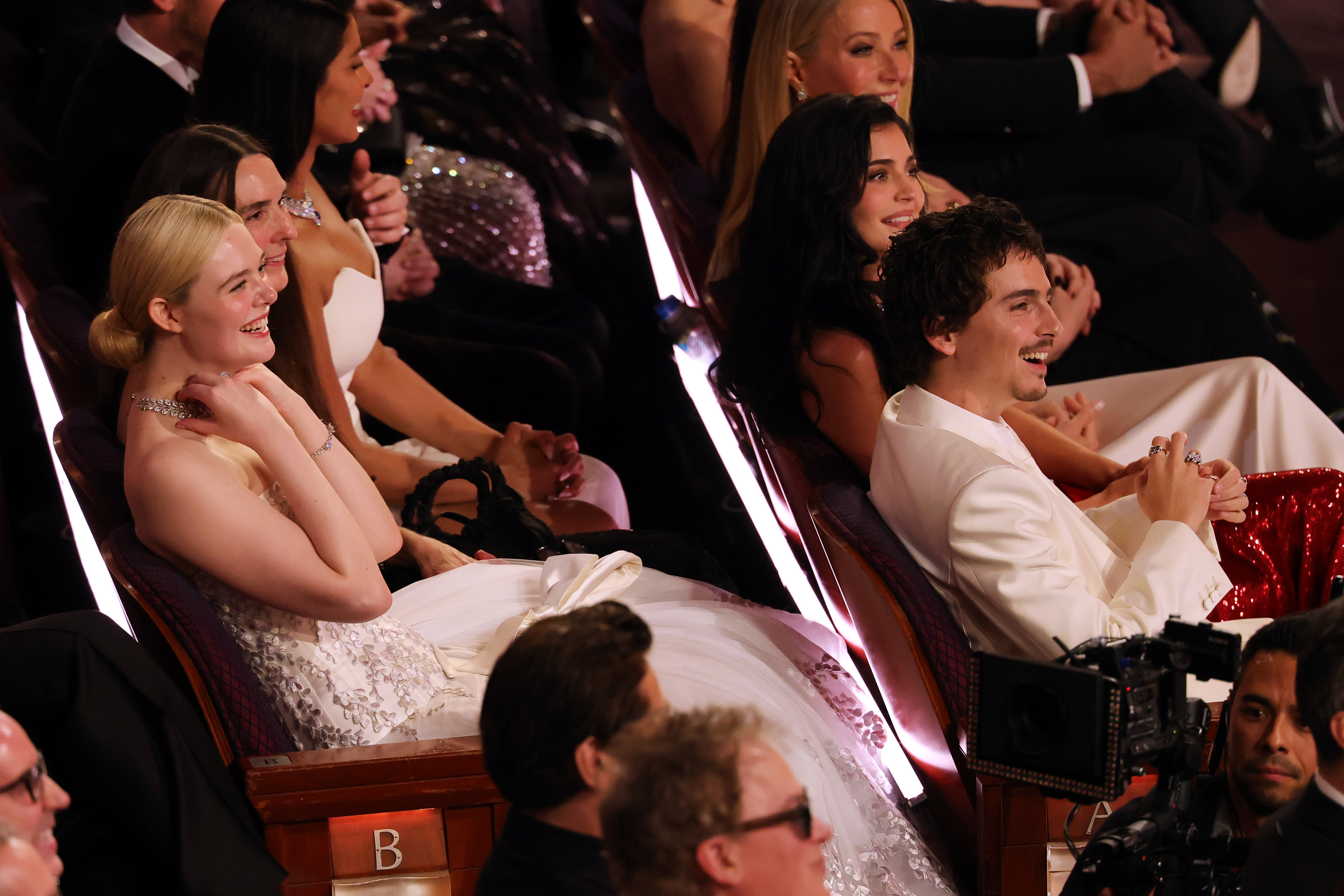 Timothée Chalamet and Kylie Jenner are seated with (L-R) Elle Fanning, Priyanka Chopra, Gwyneth Paltrow at the 2026 Oscars.