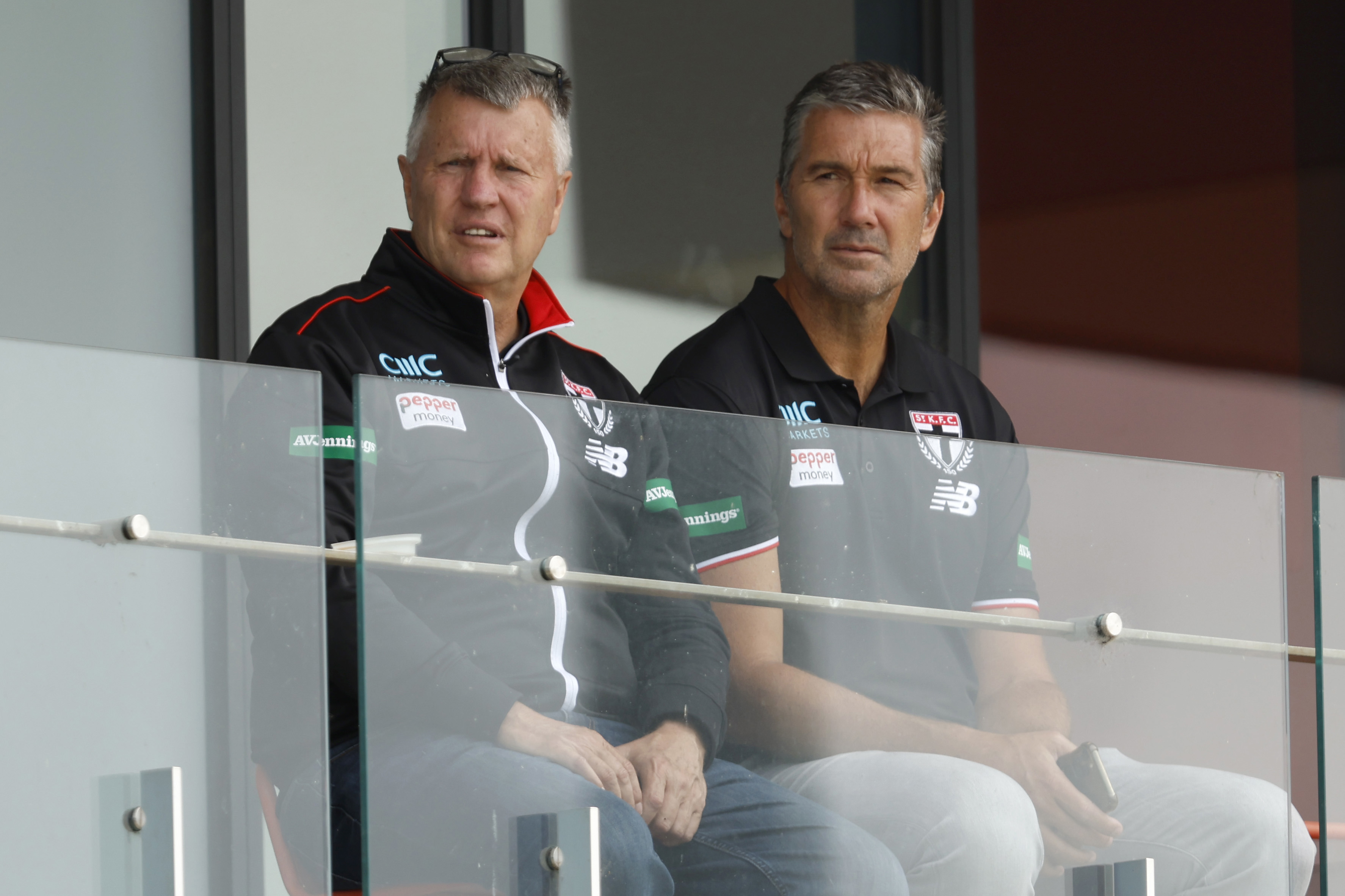 Head of Talent and Acquisition, Graeme Allan and List Manager Stephen Silvagni look on during a St Kilda training session in February 2024.