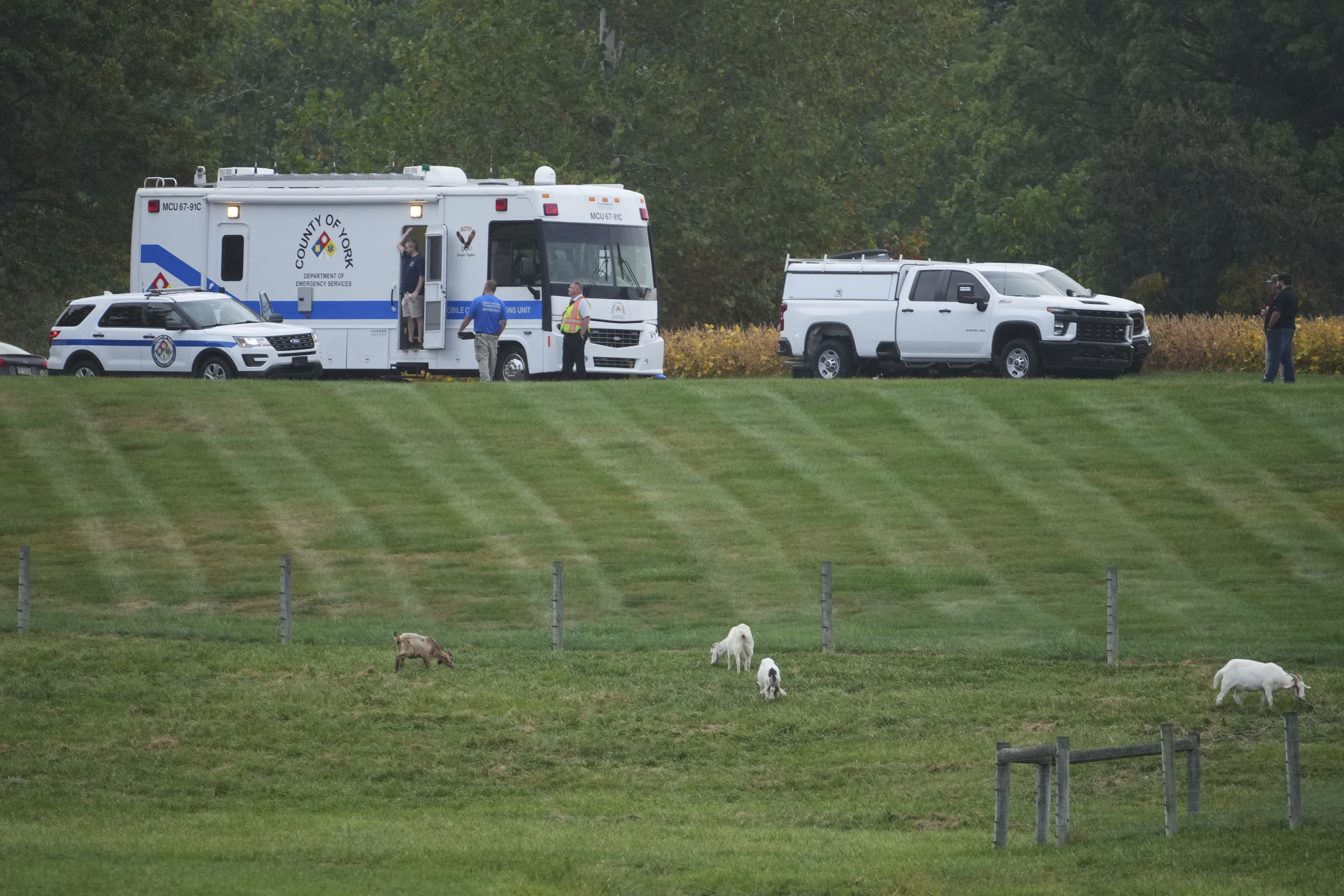 First responders work the scene after several people were injured during a shooting on Wednesday, Sept. 17, 2025, in North Codorus, Pa. (AP Photo/Matt Slocum)