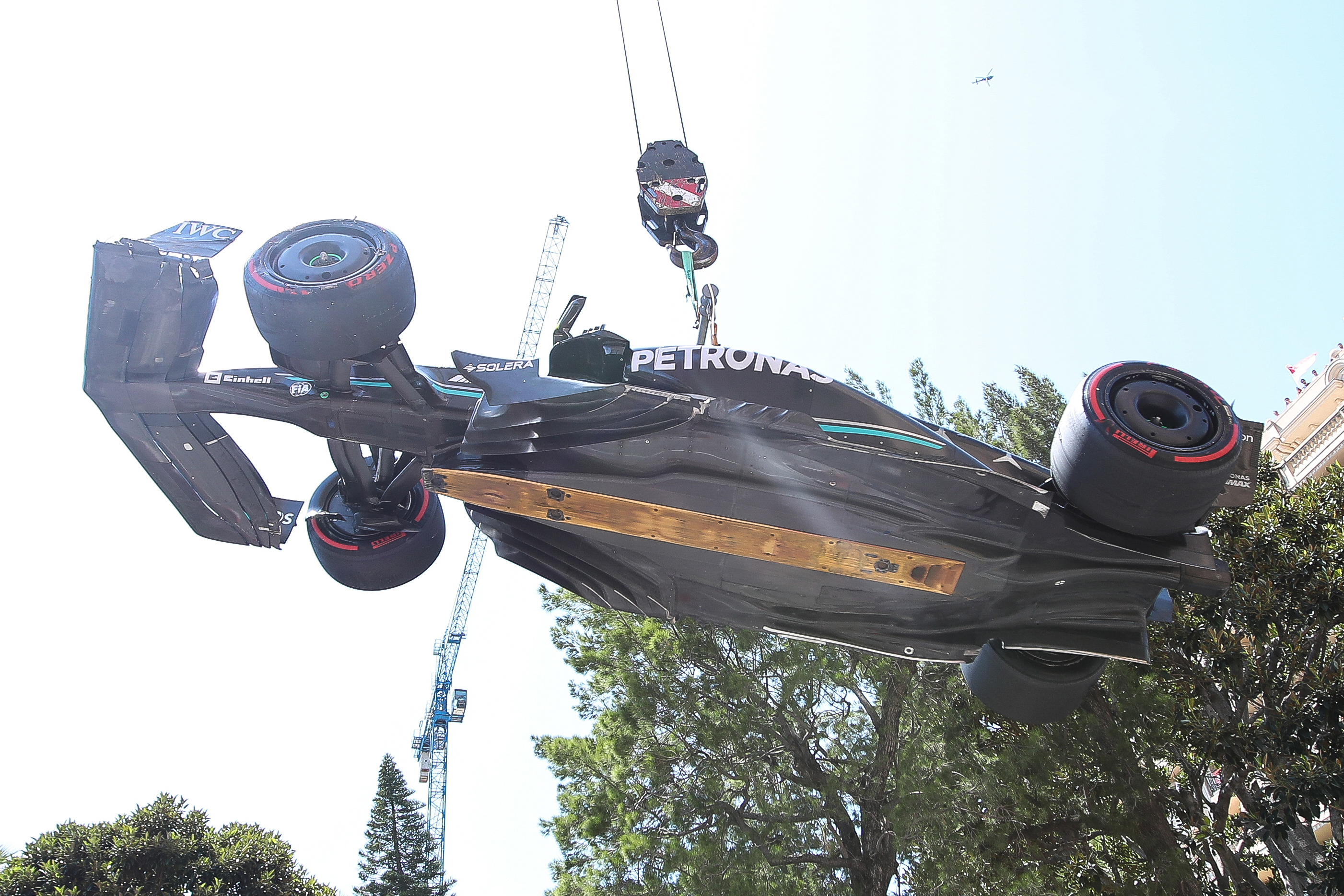The car of Lewis Hamilton of Great Britain and Mercedes is lifted on a crane after he crashed during final practice ahead of the F1 Grand Prix of Monaco at Circuit de Monaco on May 27, 2023 in Monte-Carlo, Monaco. (Photo by Eric Alonso/Getty Images)