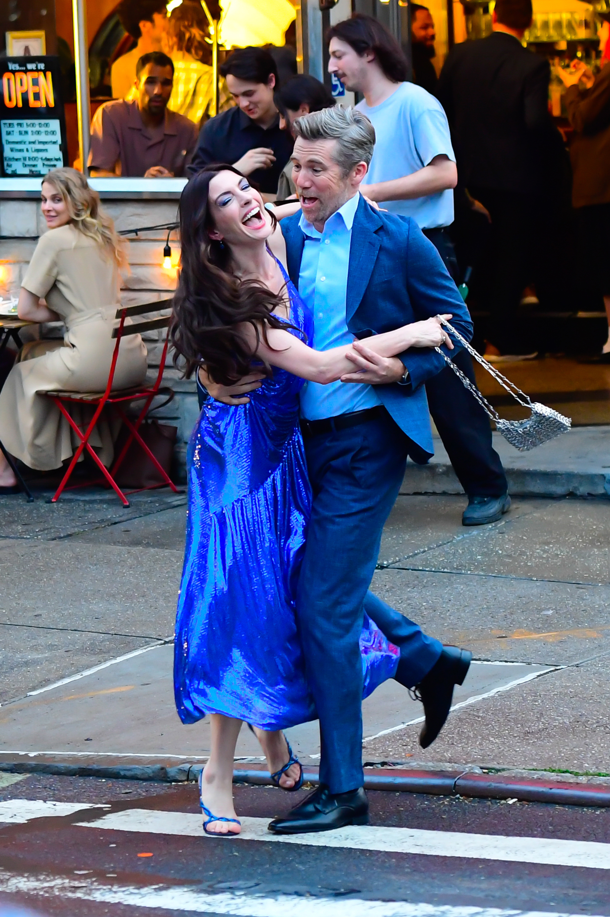 Anne Hathaway and Patrick Brammall are seen on the set of The Devil Wears Prada 2 in Brooklyn  on August 5, 2025 in New York City