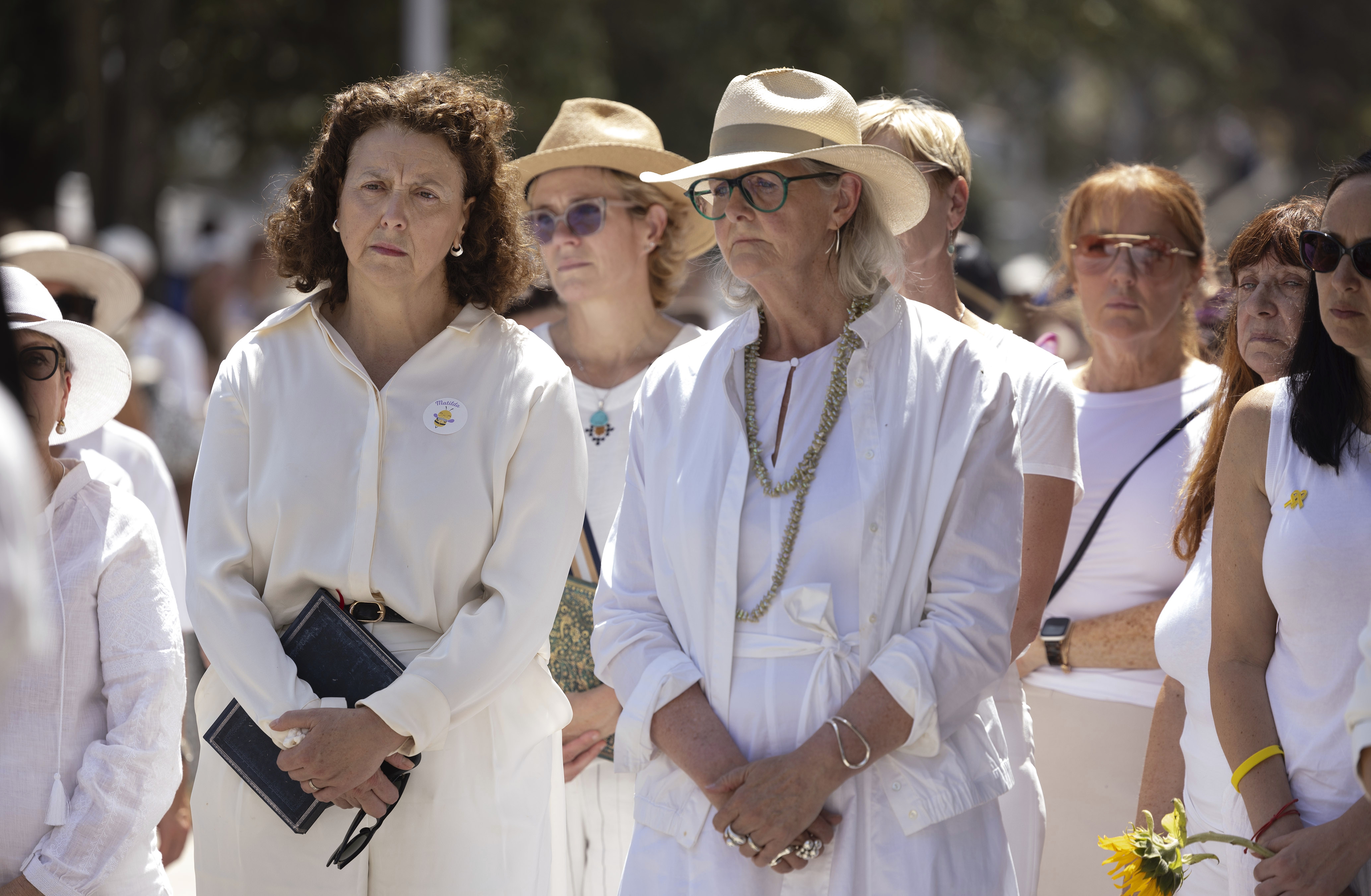 Dr Monique Ryan MP stands by Sam Mostyn The Governor- General of Australia  at a women from all backgrounds, gathering at  Bondi Beach and mark one week since the Chanukah terror attack and honour the victims.