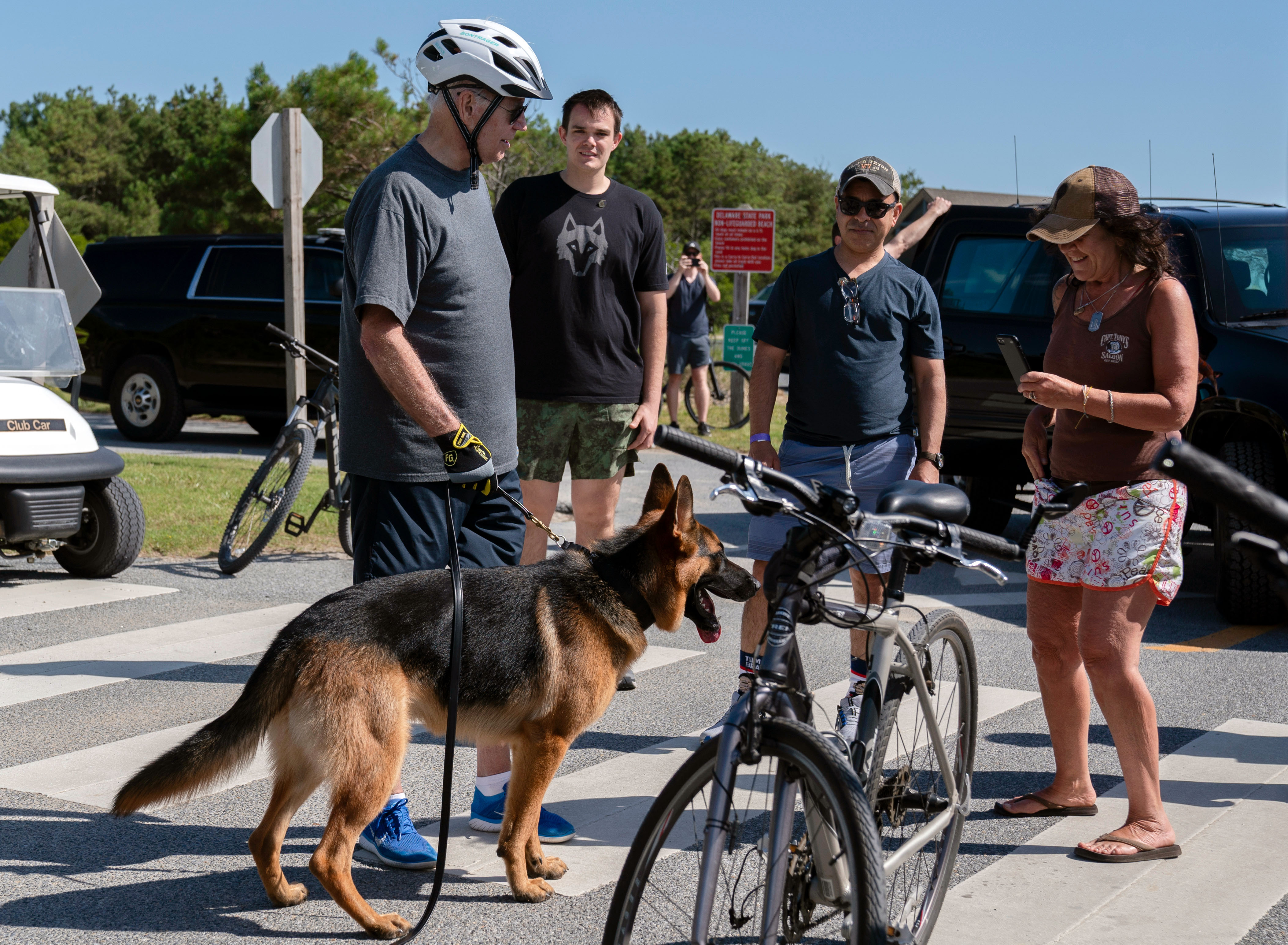 Joe Biden with his dog after a bike ride