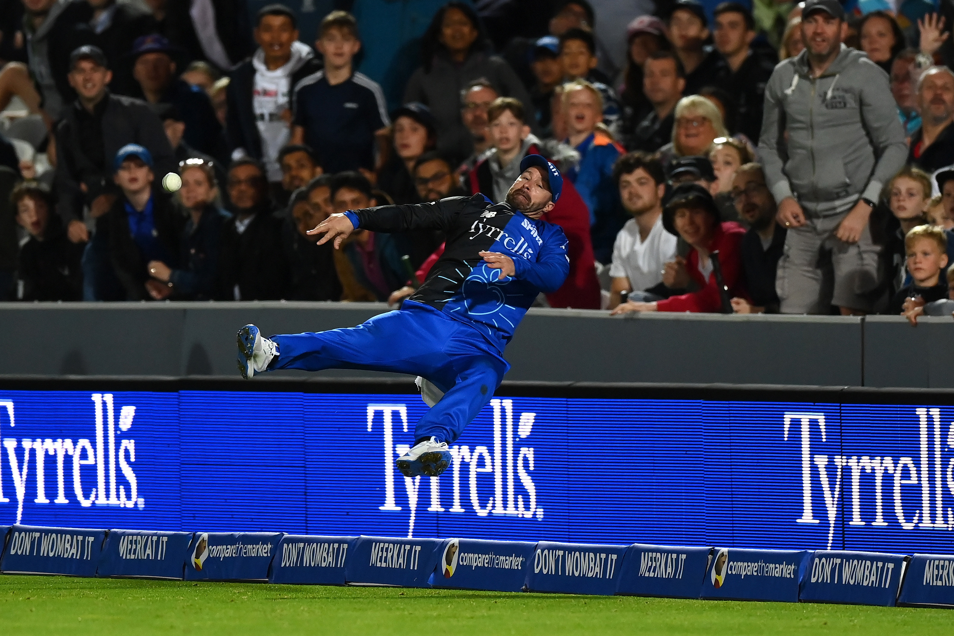 Matthew Wade of London Spirit stops the ball from going for six after Gus Atkinson clipped a full toss off his legs.