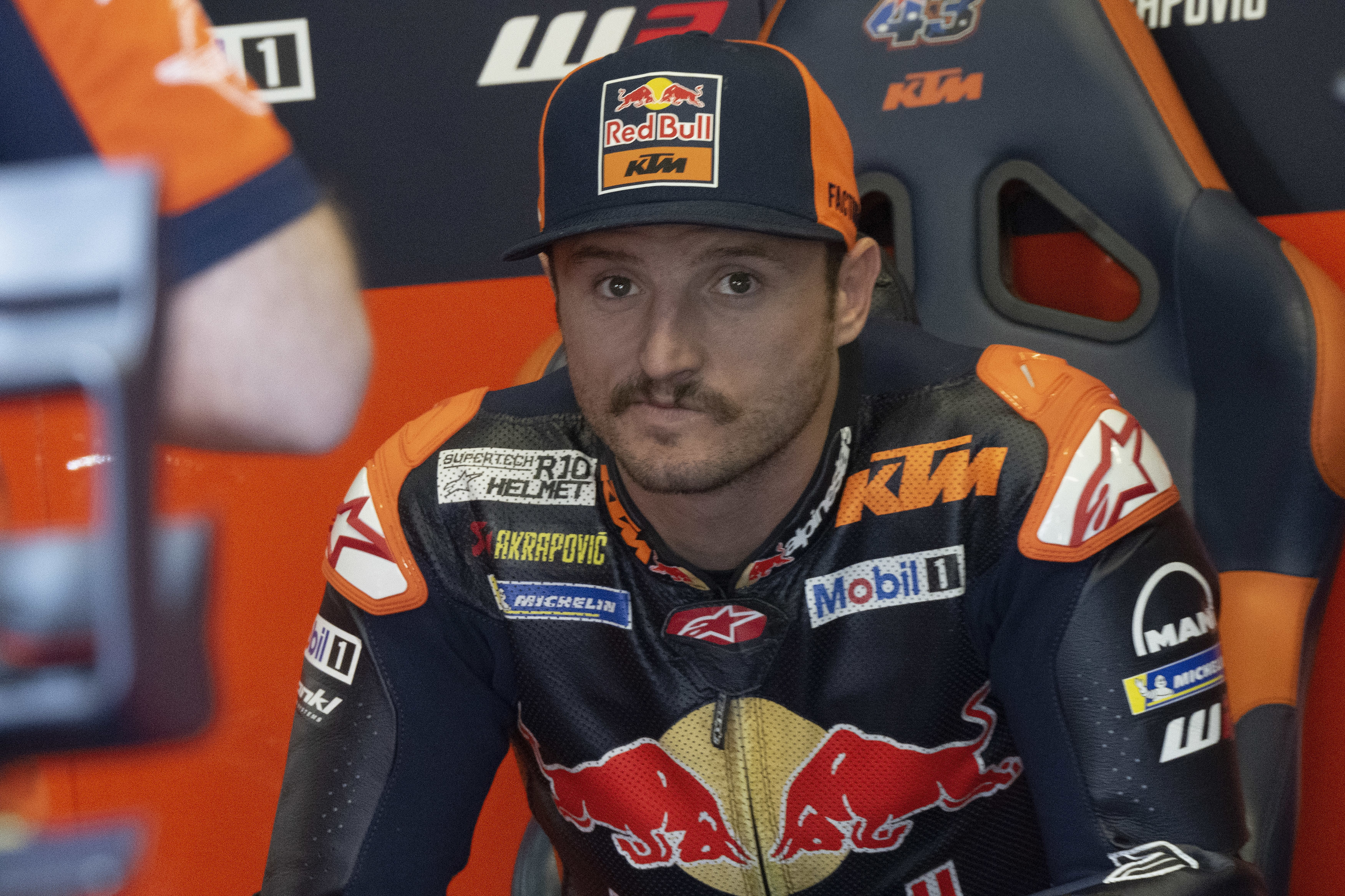 Jack Miller of Australia and Red Bull KTM Factory Racing looks on in box during the MotoGp qualifying practice during the MotoGP Of Italy - Qualifying  at Mugello Circuit on June 01, 2024 in Scarperia, Italy. (Photo by Mirco Lazzari gp/Getty Images)