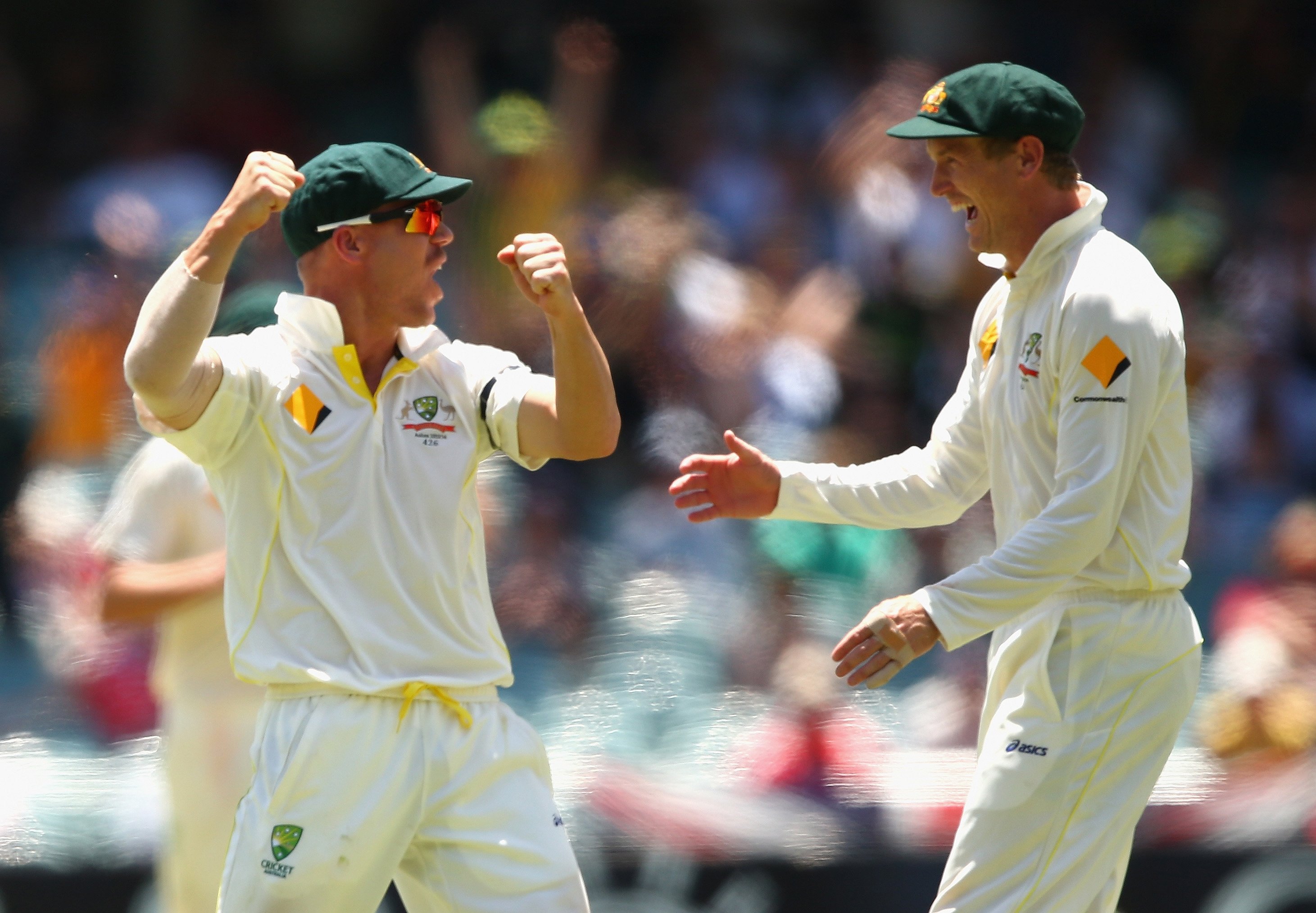 David Warner (L) and George Bailey (R) pictured during day three of the Second Ashes Test match between Australia and England at Adelaide Oval on December 7, 2013 in Adelaide, Australia.