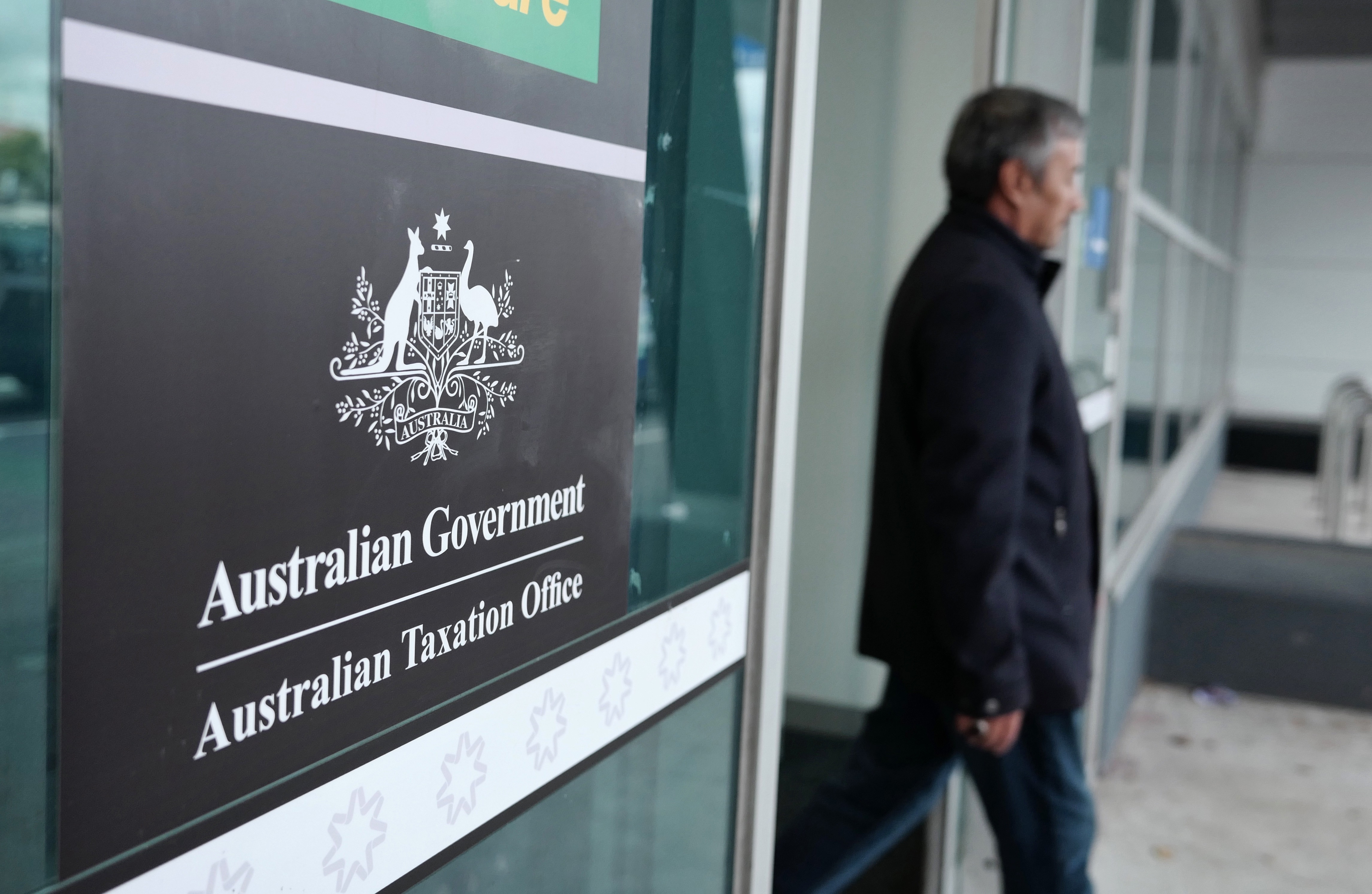 People walking out of the ATO Office.