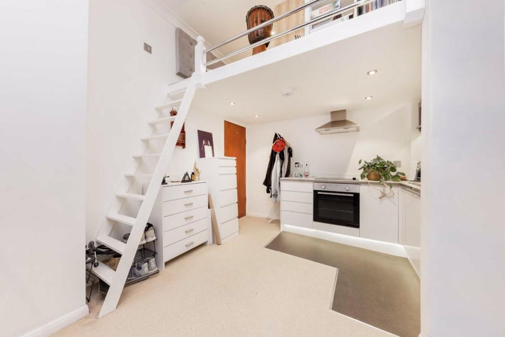 London studio flat is so small that you can't even stand up in the bedroom.