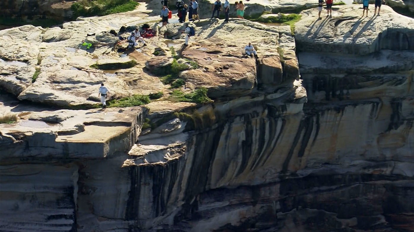 Two boys trapped under cliff face after jumping from rocks in Sydney