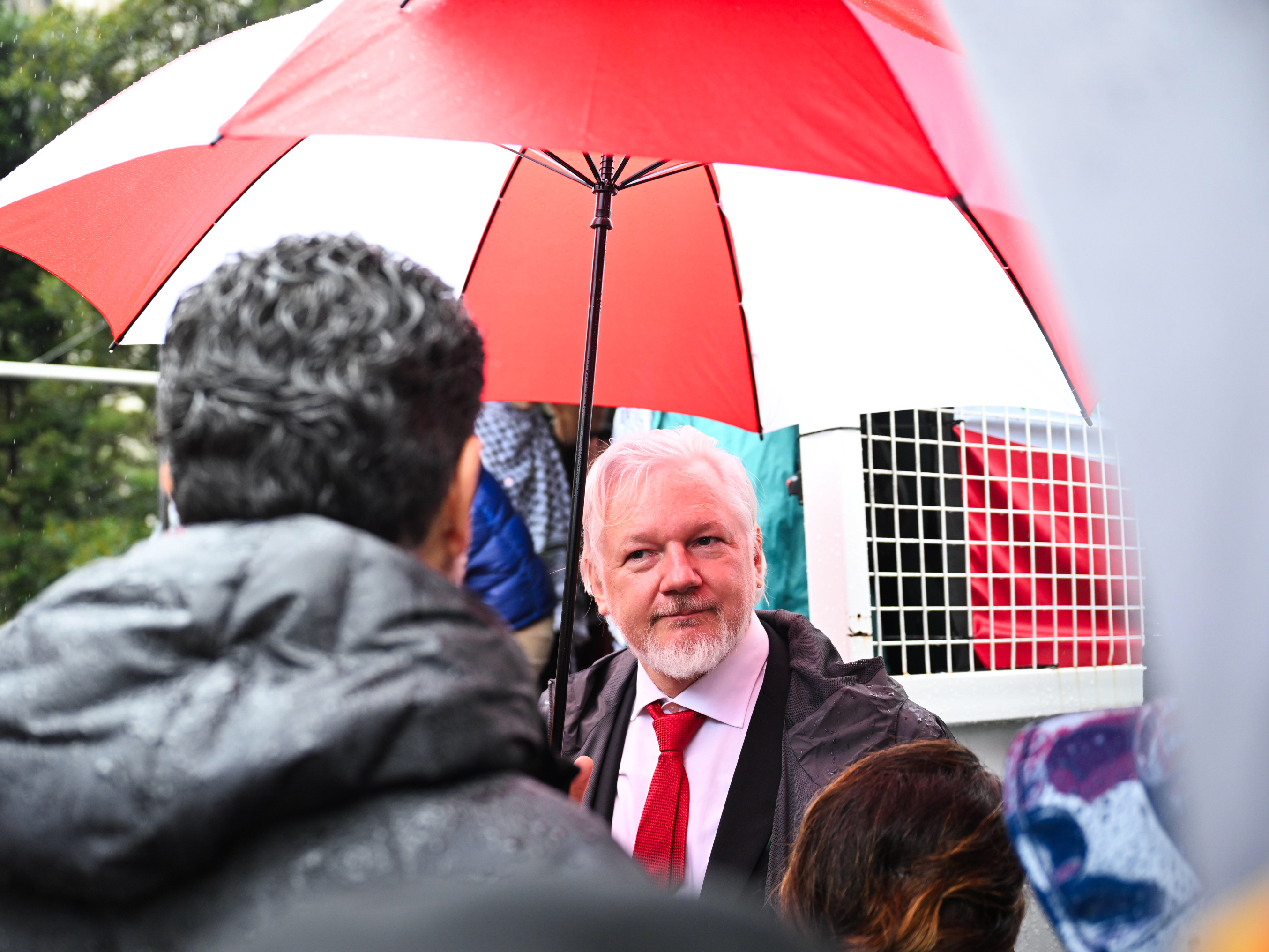 Julian Assange with Pro-Palestine protesters gathering before marching across the Sydney Harbour Bridge to bring attention to the ongoing Israel bombing and aid restrictions to Gaza. 3 August 2025 Photo: Janie Barrett 