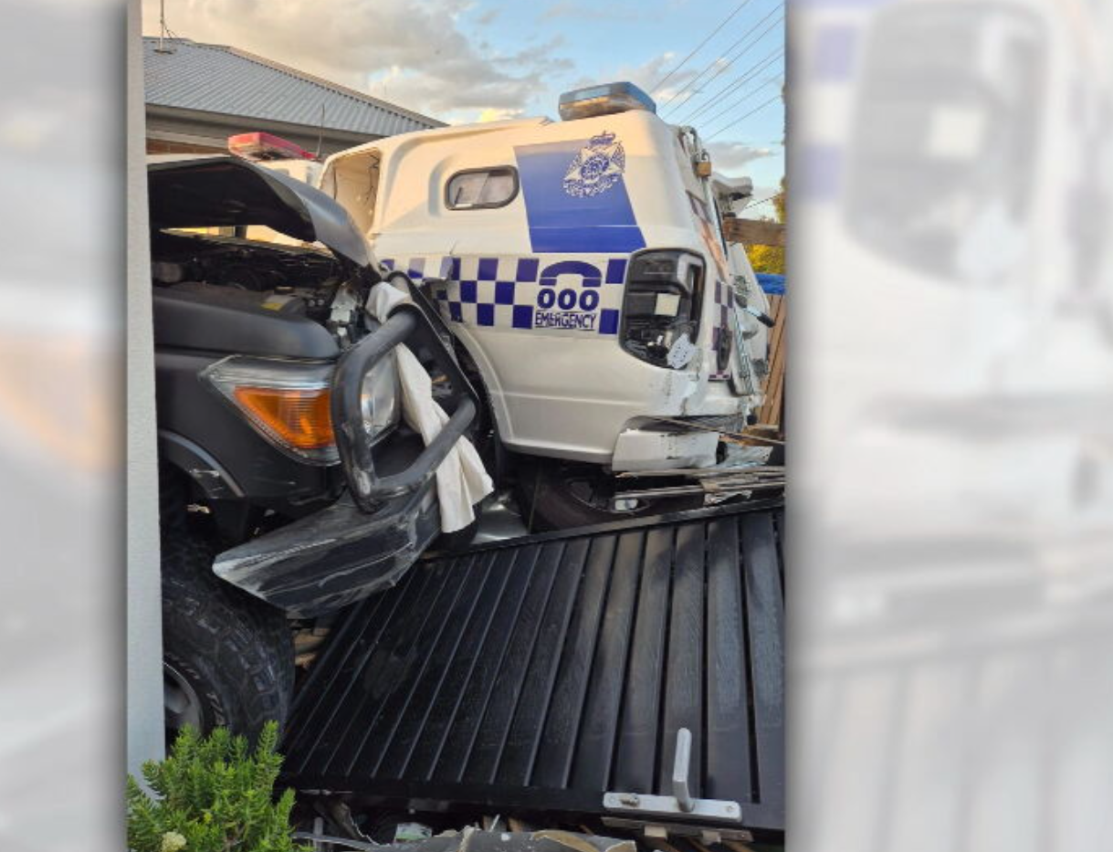 The police car was rammed more than a dozen times, also damaging neighbouring fences.
