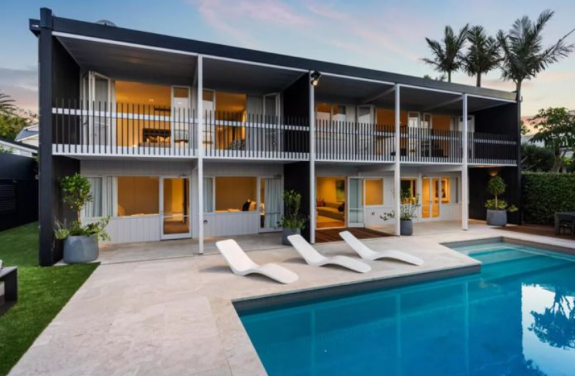 Shoe supremo lists poolside mansion for secret sum