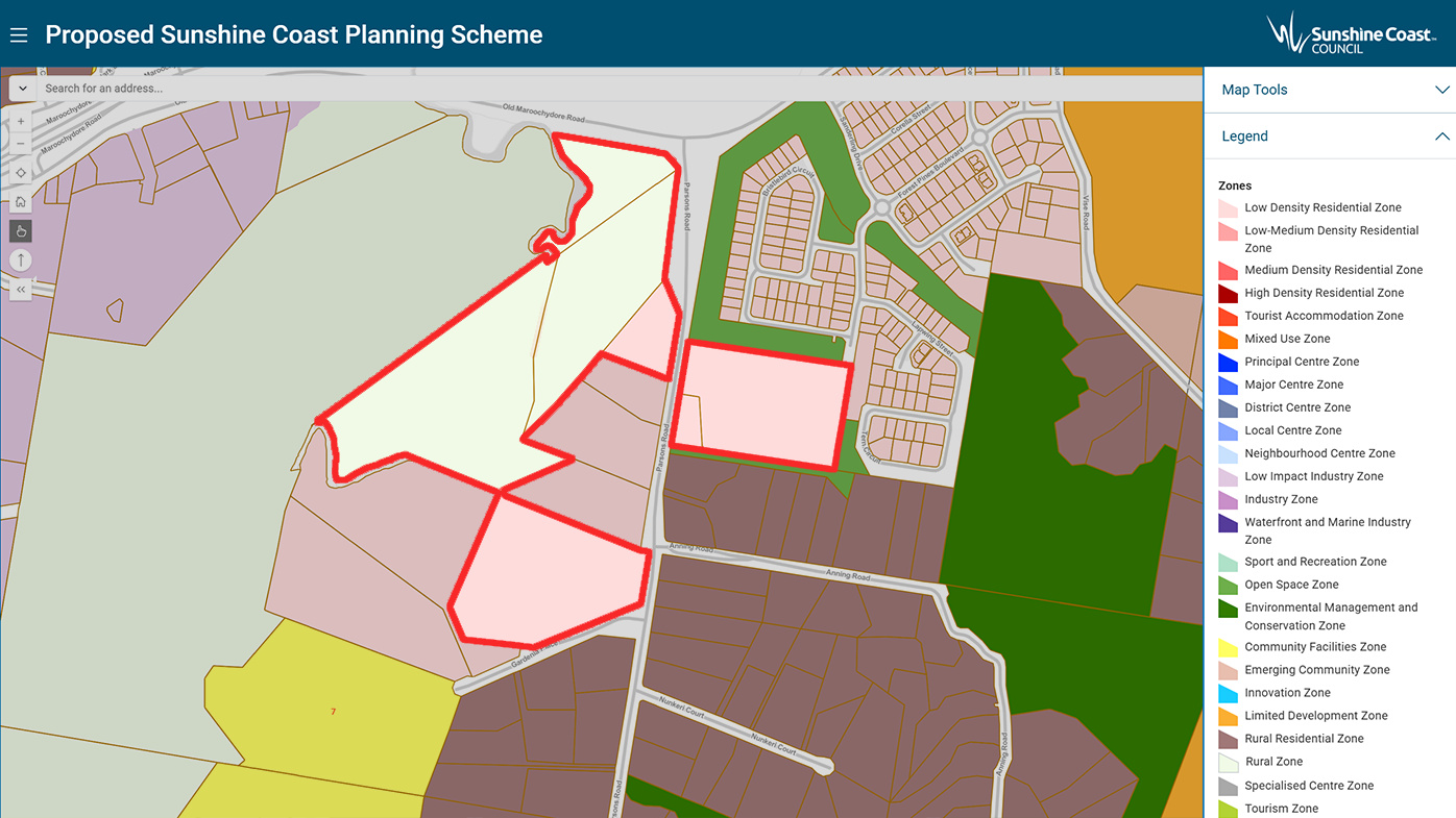 Almost half of Farleigh Farms, outlined here in red, would be rezoned as low-density residential (pink) while the rest would remain rural (green).