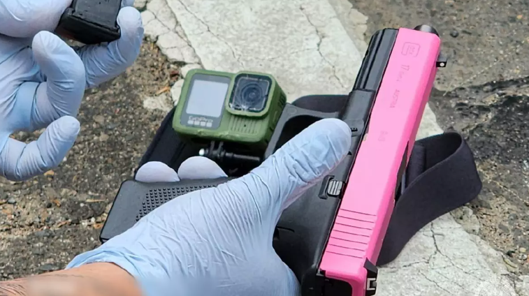 Officers located a Glock-style pistol with a pink slide.