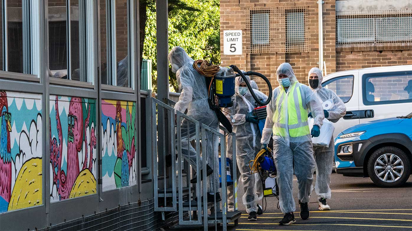 Cleaners at Bondi Beach Public School after a positive case was recorded there.
