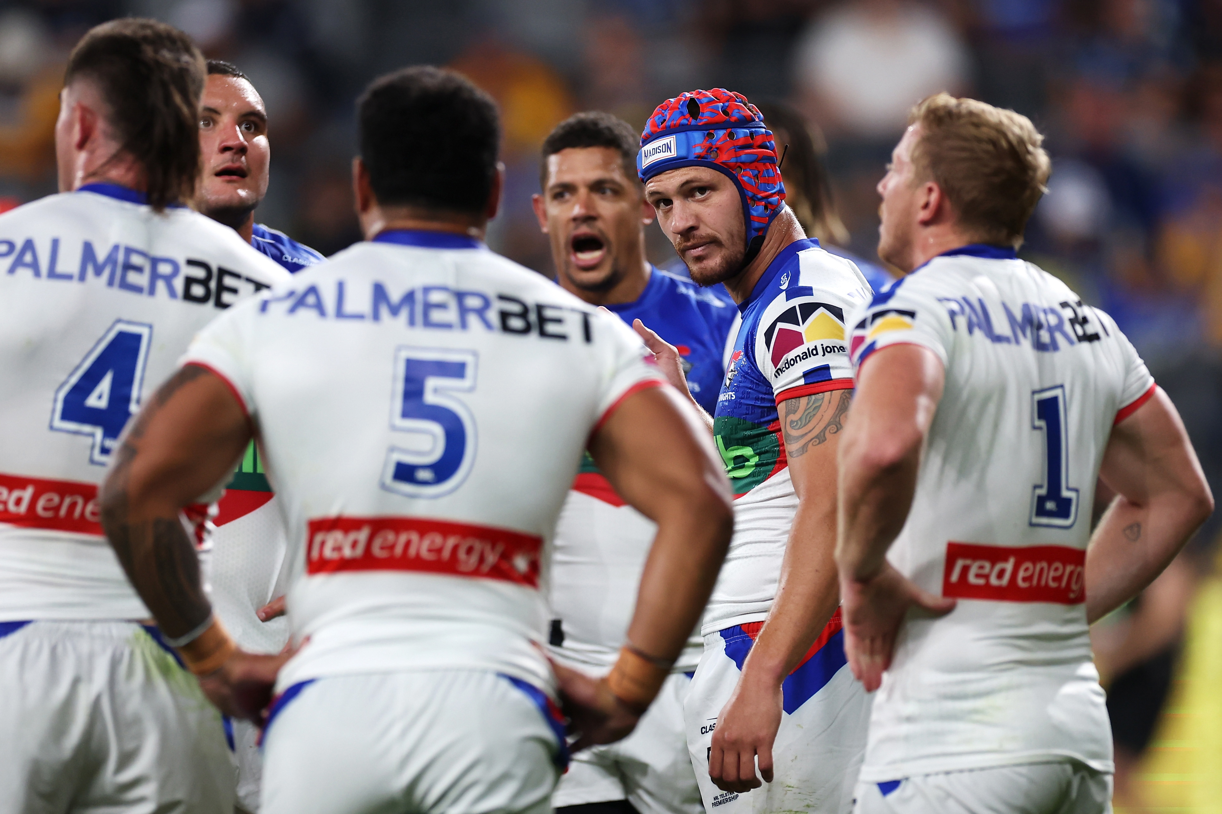 Knights players react to another Eels try.