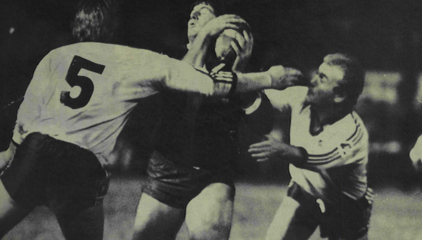 Chris Close is tackled by Greg Brentnall (left) and Steve Rogers in the State of Origin match in 1980.