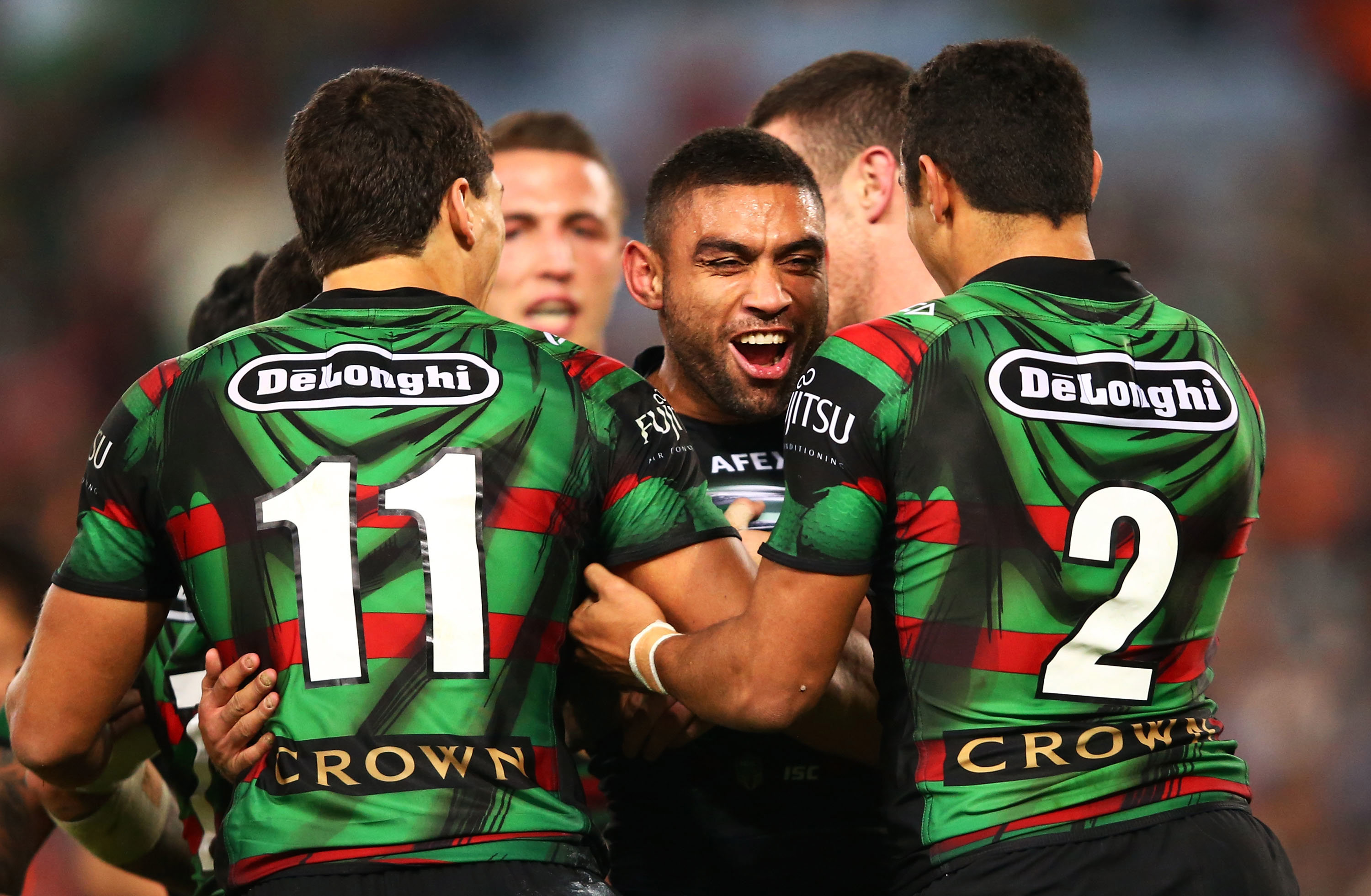 Nathan Merritt celebrates a try during the round 14 NRL match between the South Sydney Rabbitohs and the Wests Tigers at ANZ Stadium on June 13, 2014 in Sydney, Australia.