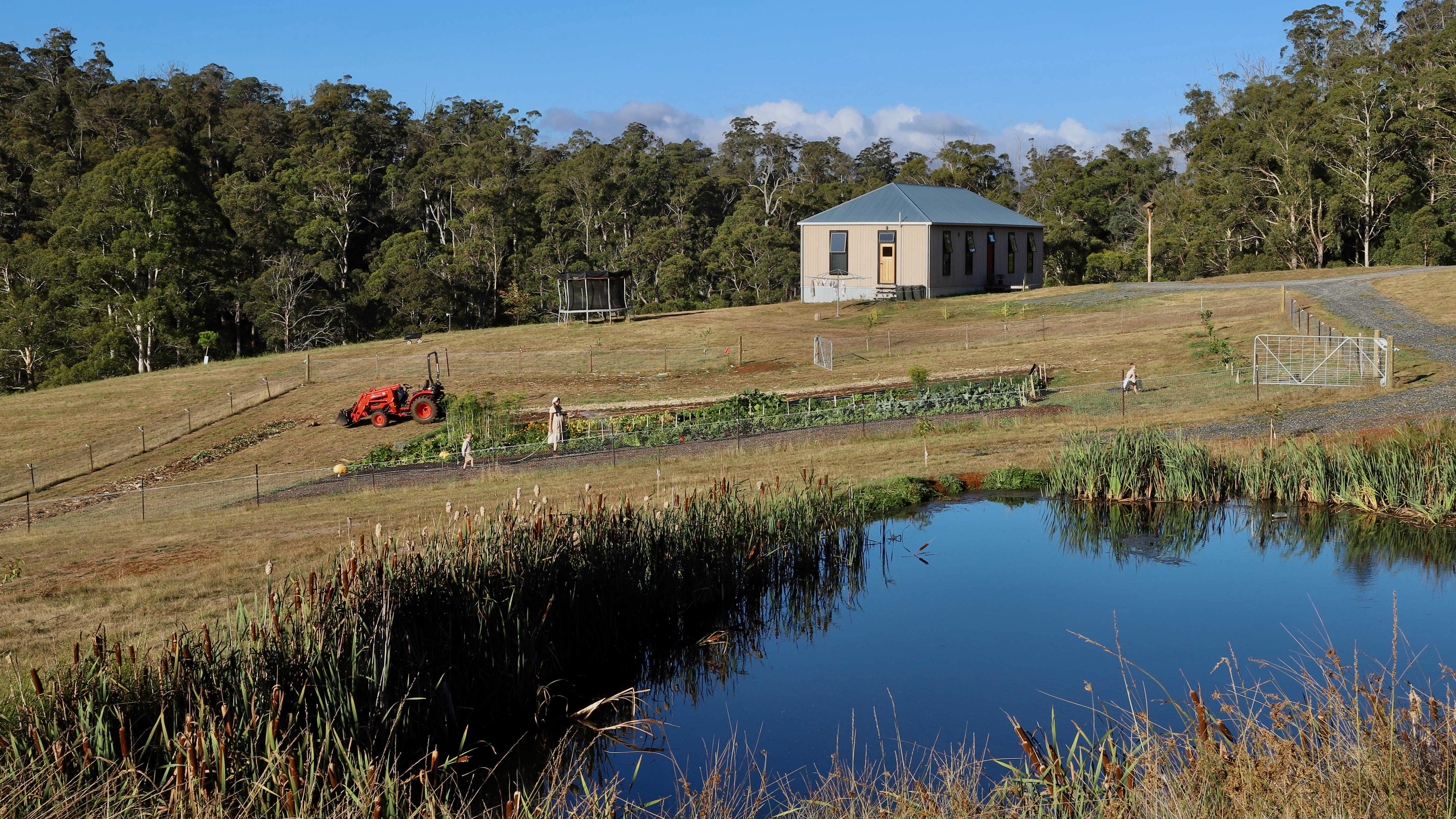 The home is open plan, with high ceilings and large windows to make the most of the rural scenery in northern Tasmania.