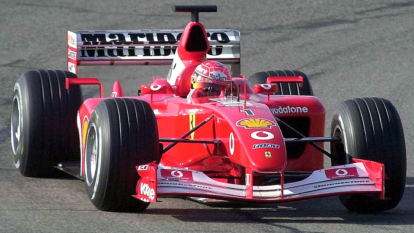 F1 World Champion Michael Schumacher of Germany steers the new Ferrari 2002 car. 