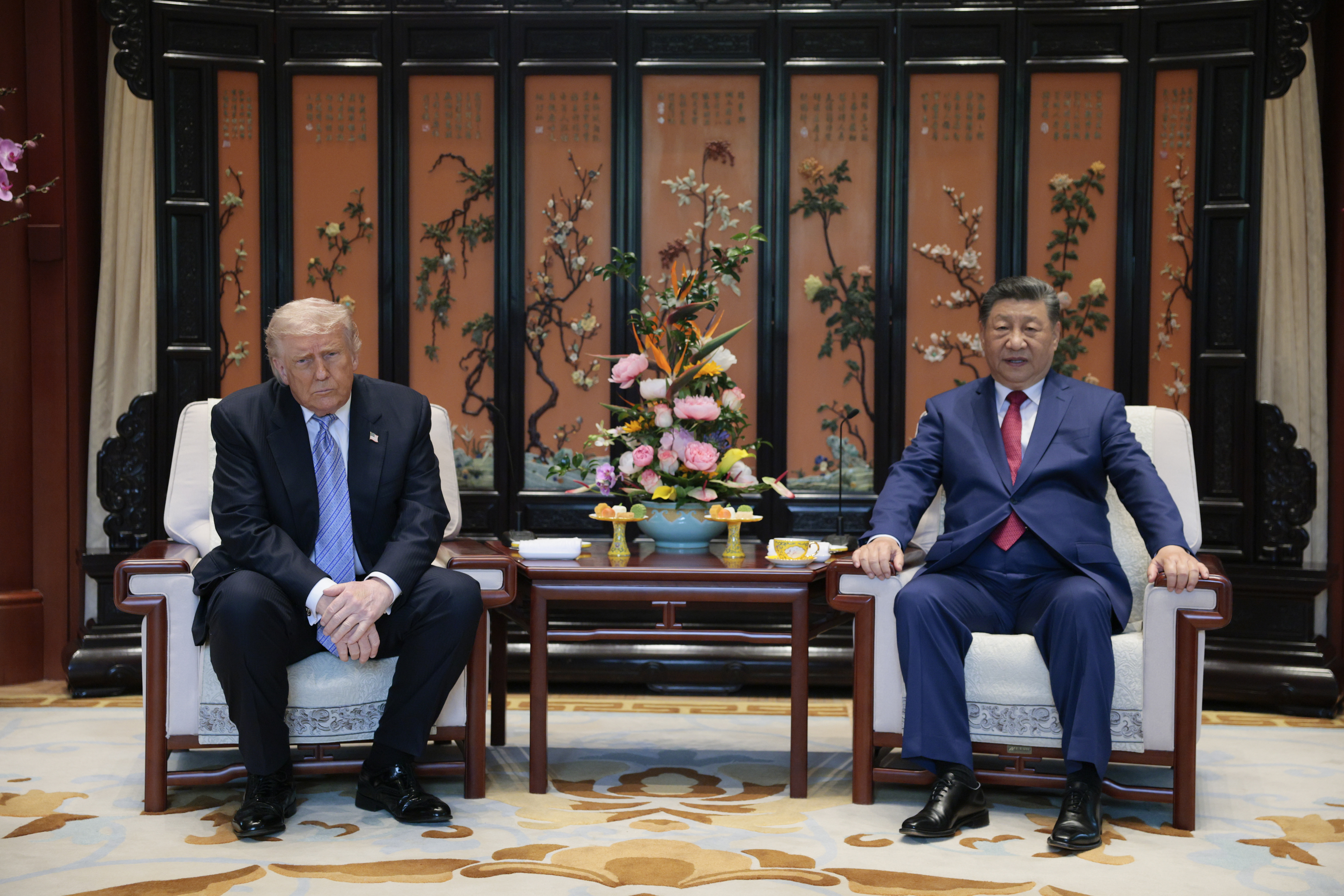 BEIJING, CHINA - MAY 15: Chinese President Xi Jinping and U.S. President Donald Trump attend a meeting on the sidelines during a tour of the Zhongnanhai Garden on May 15, 2026 in Beijing, China. Trump and other U.S. officials are finishing up a visit intended to address the Iran conflict, trade imbalances, and the Taiwan situation while establishing new bilateral boards for economic and AI oversight.